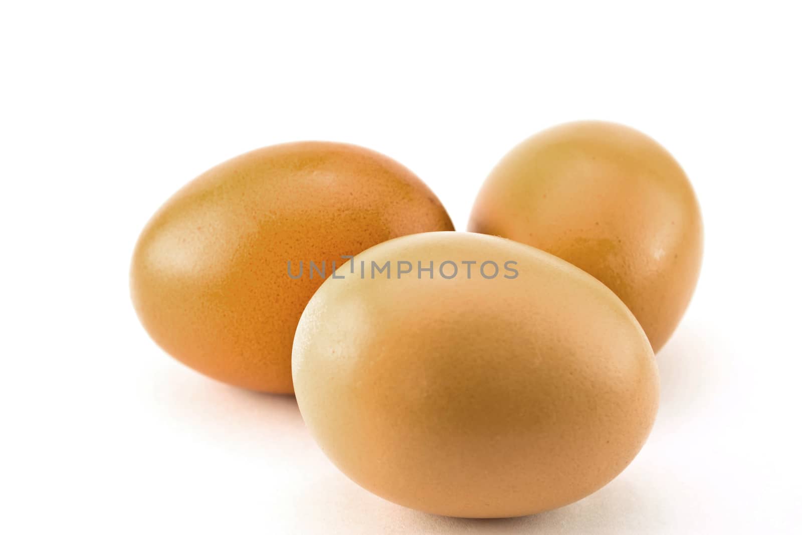 Eggs on a white background by Thanamat