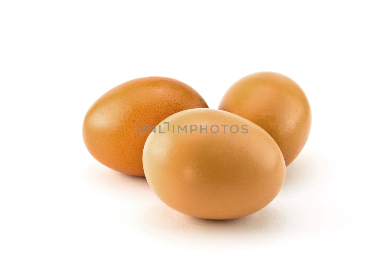 Eggs on a white background by Thanamat