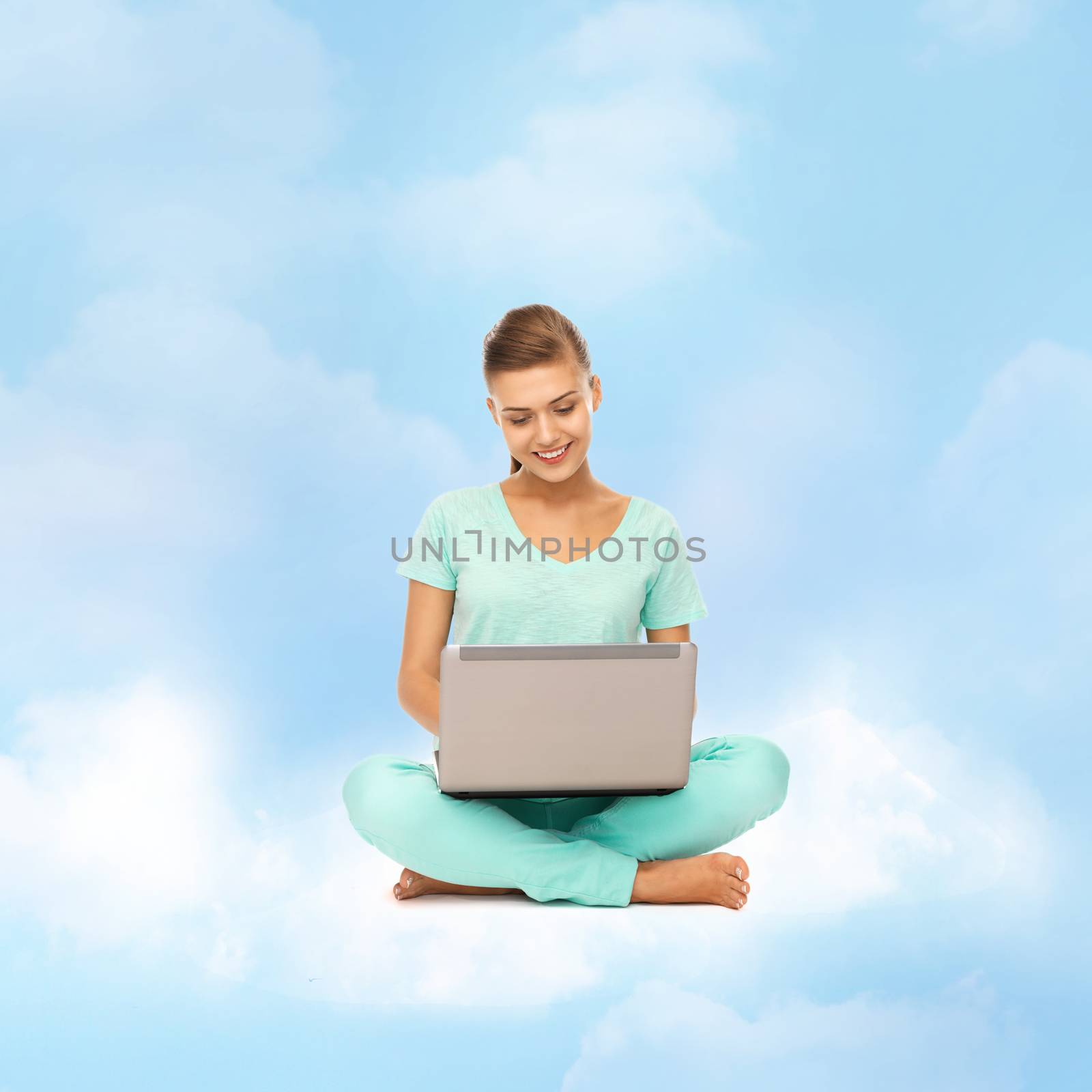 woman sitting on the cloud with laptop by dolgachov