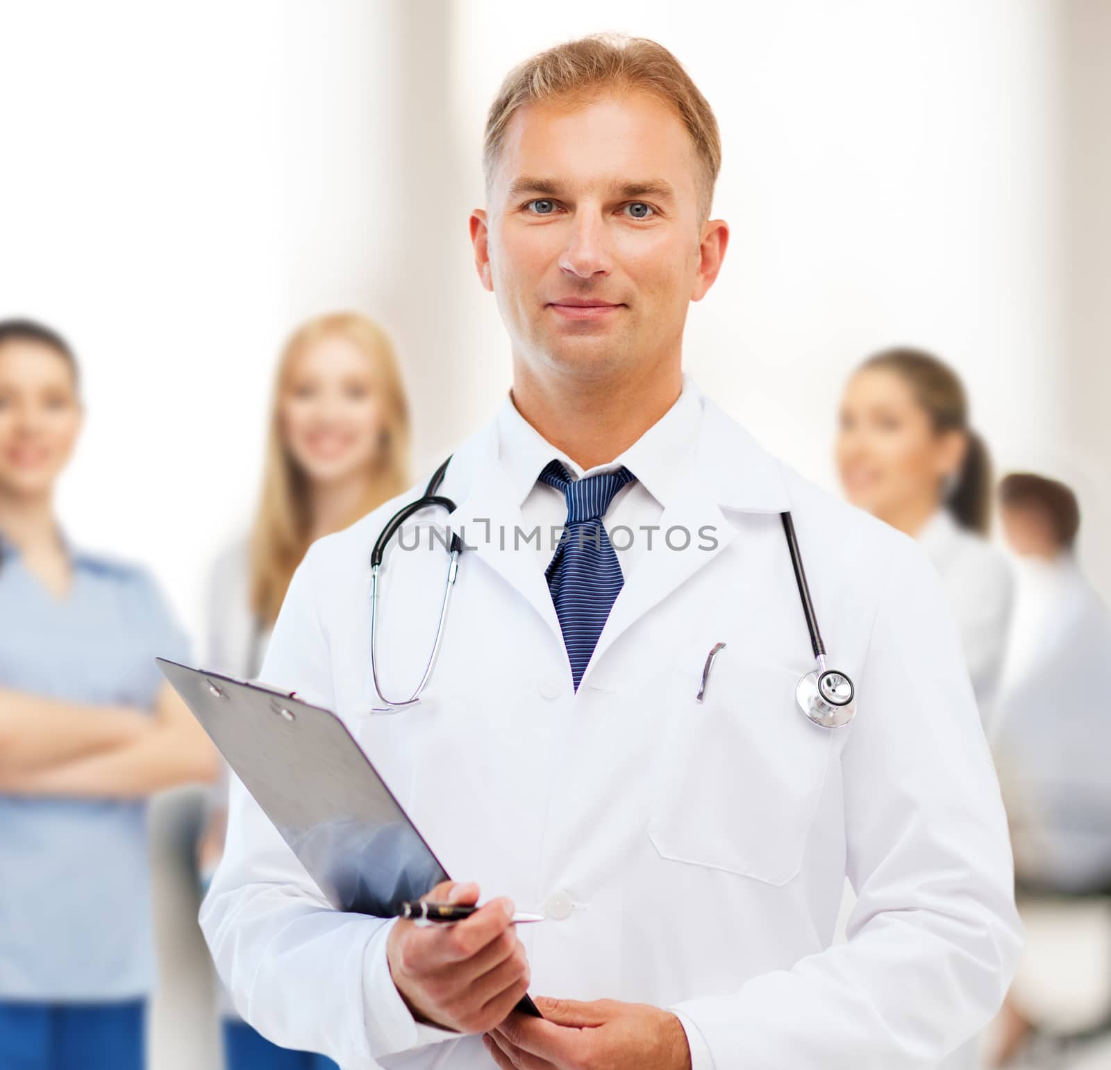 healthcare and medical concept - male doctor with stethoscope and clipboard