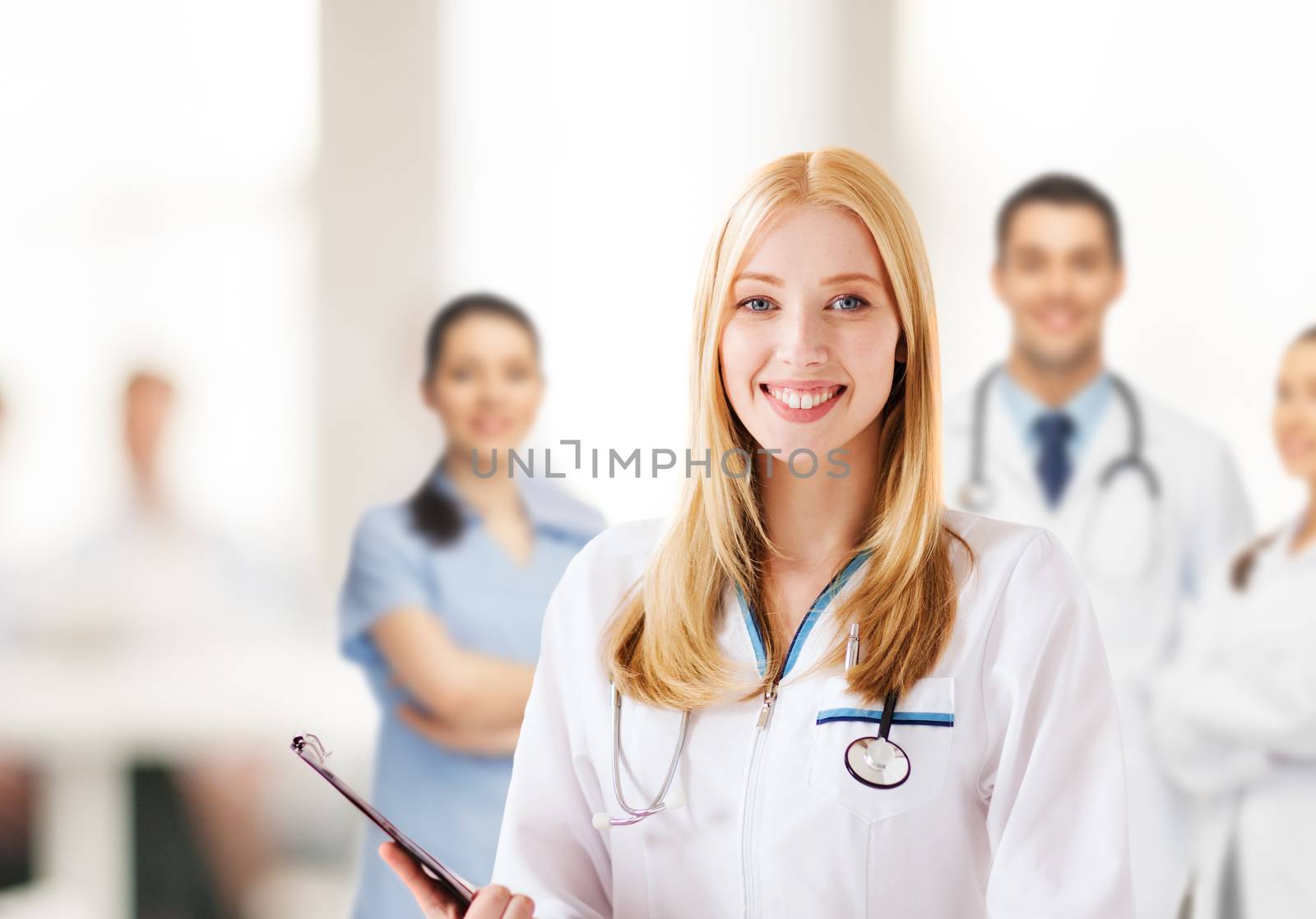 female doctor with stethoscope by dolgachov