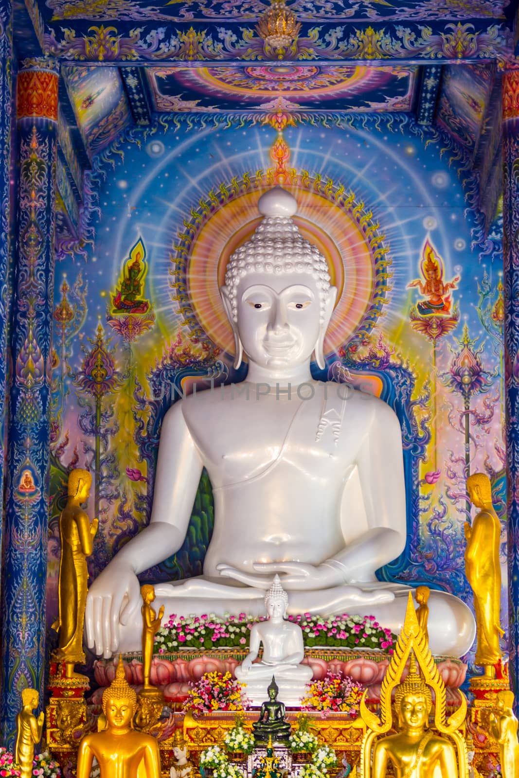 white Buddha image by nattapatt