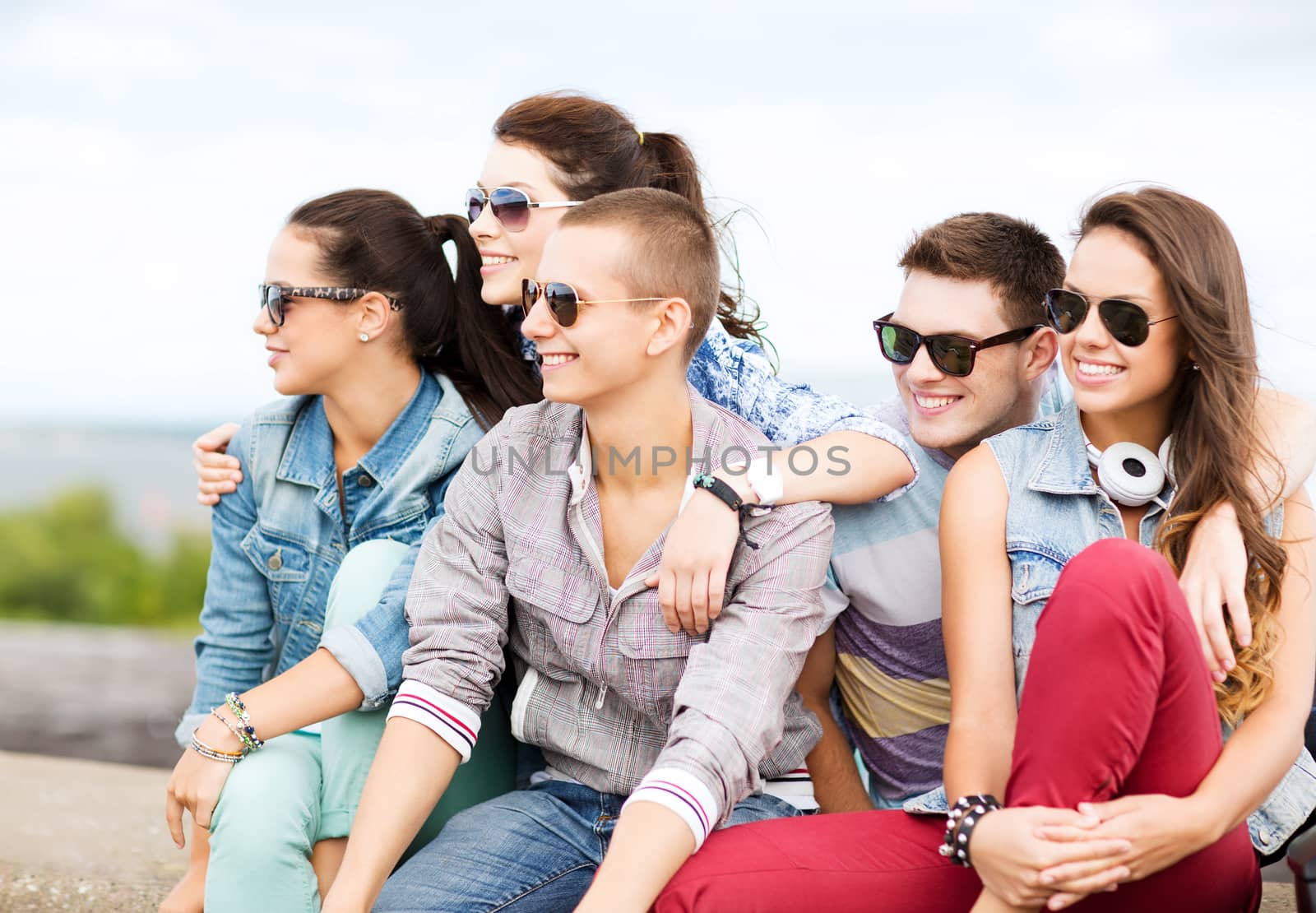 group of teenagers hanging out by dolgachov