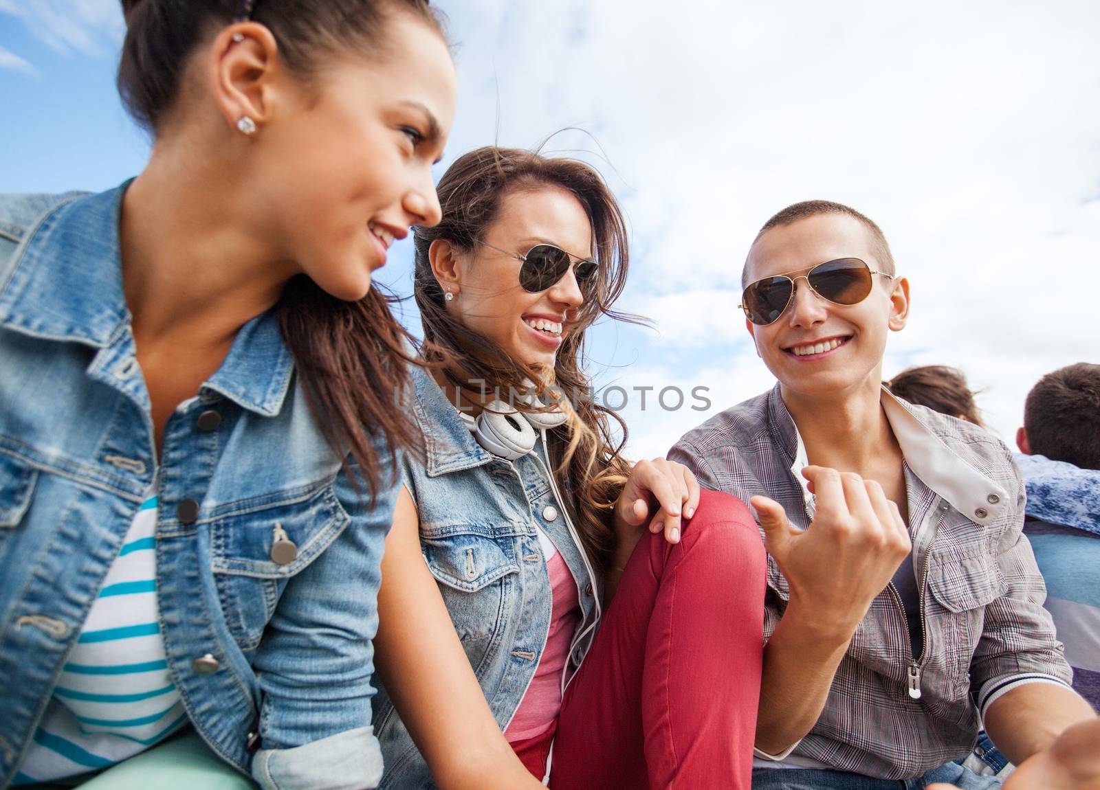 group of teenagers hanging out by dolgachov