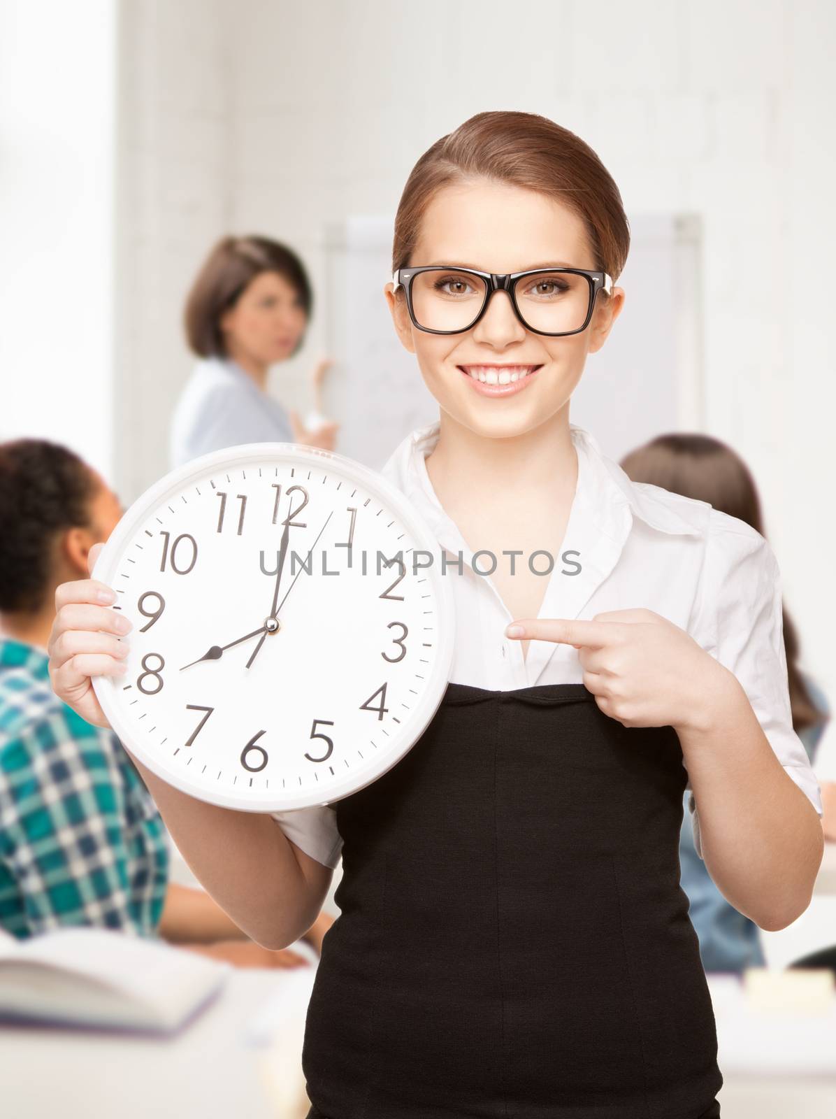 student showing clock by dolgachov