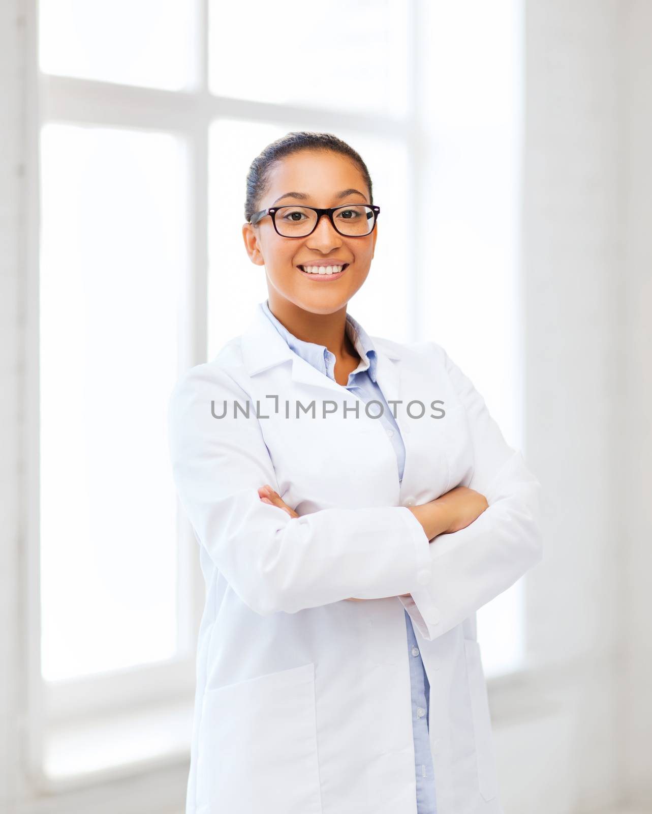 african female doctor in hospital by dolgachov