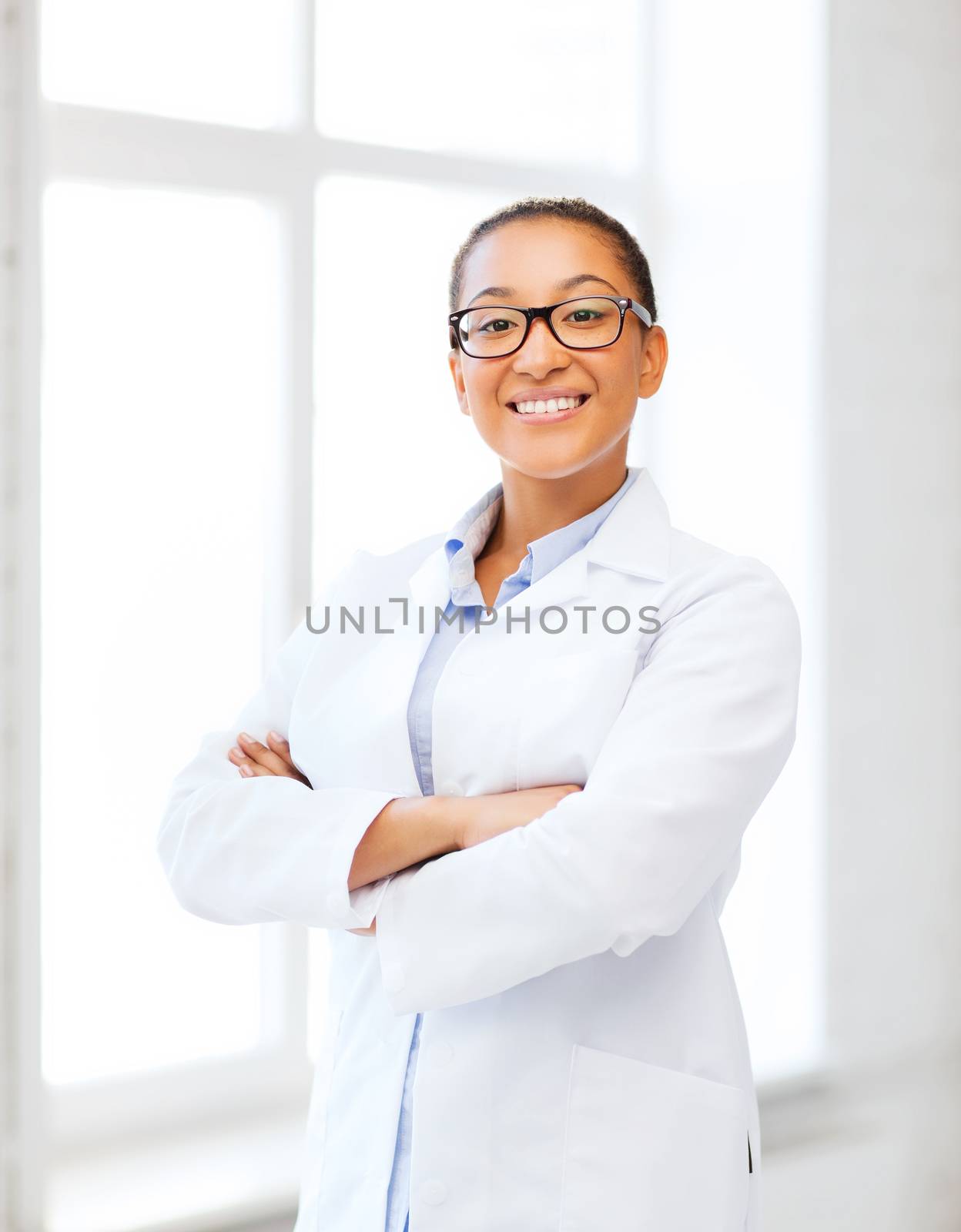 african female doctor in hospital by dolgachov