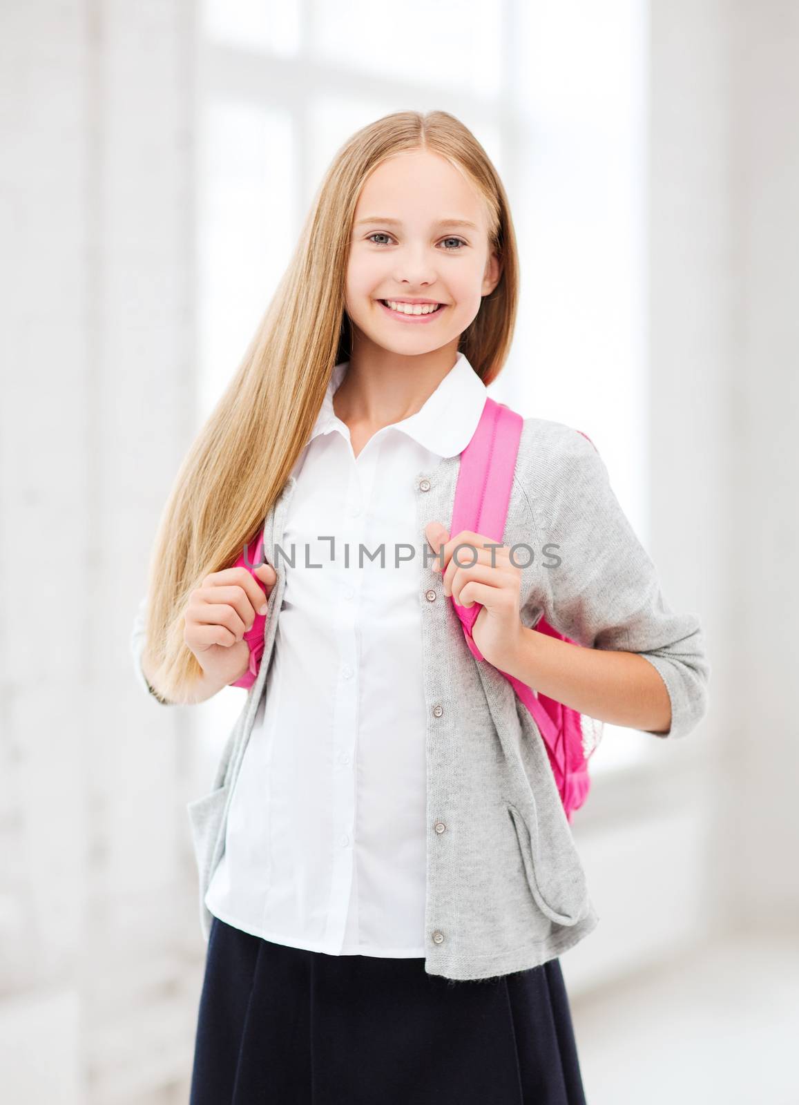education and school concept - happy and smiling teenage girl with school bag