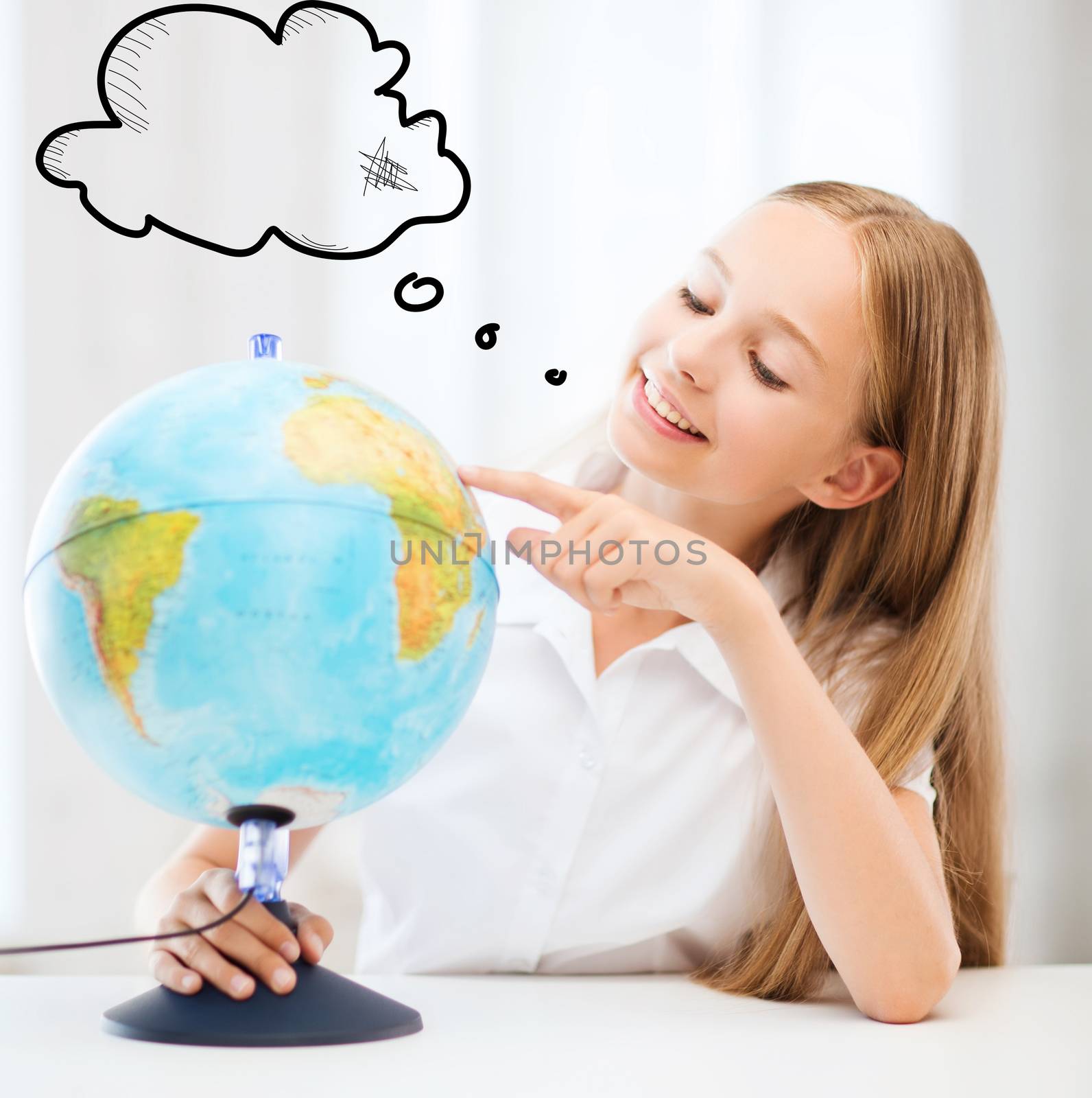 student girl with globe at school by dolgachov