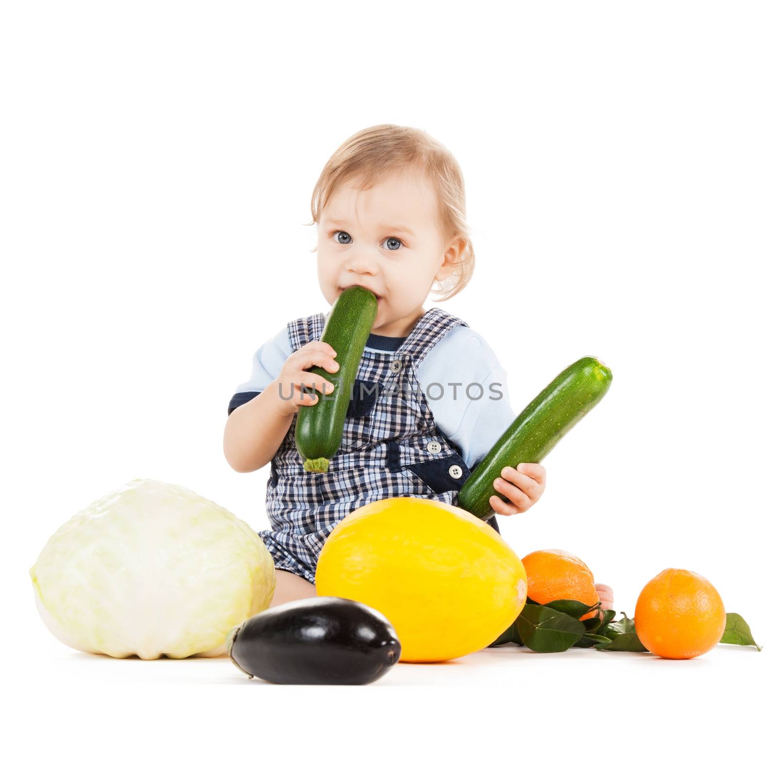 toddler eating squash by dolgachov