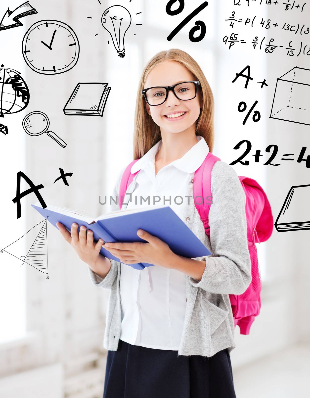 education and school concept - little student girl reading book at school