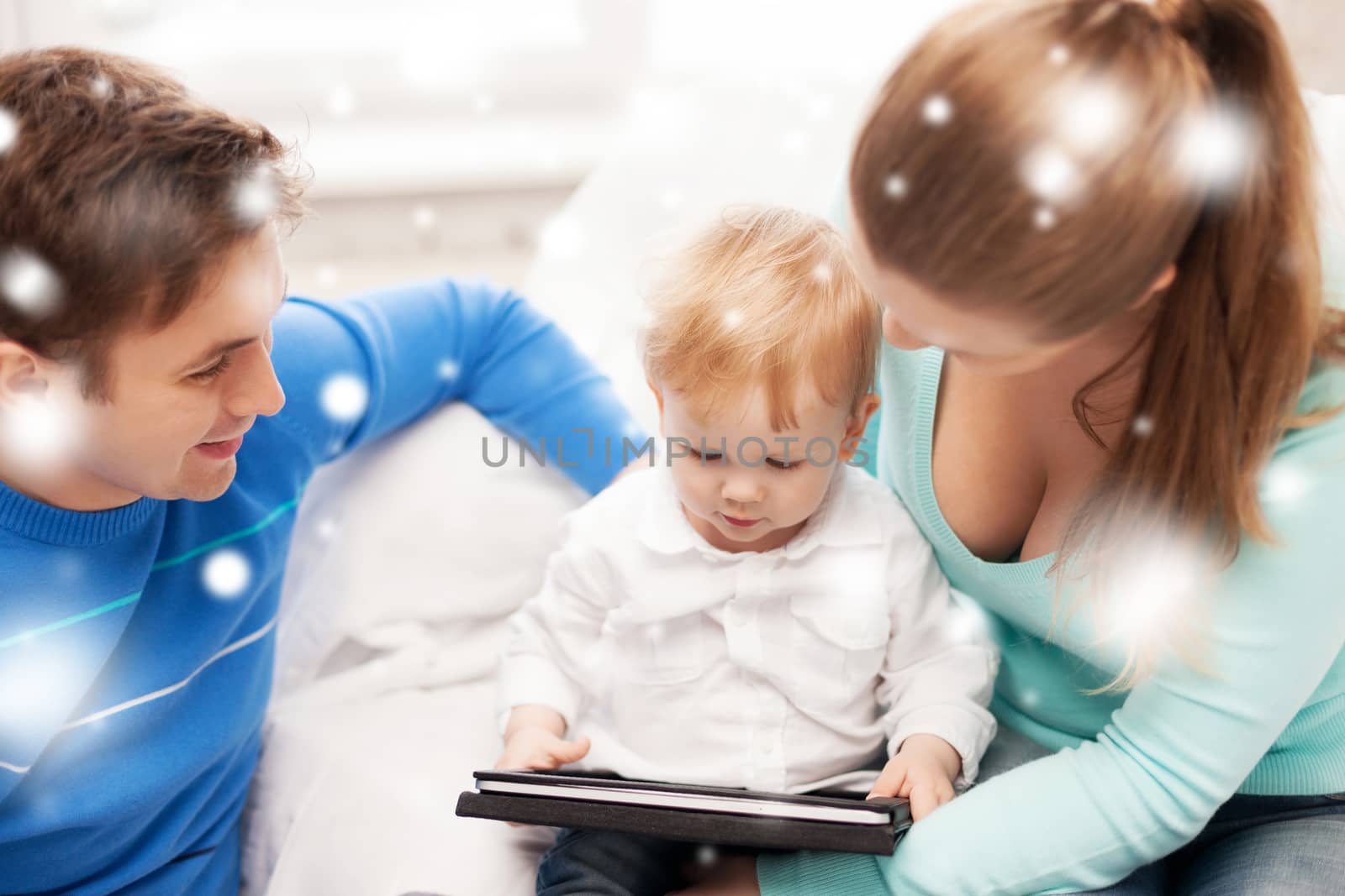 family, children, christmas, x-mas, love, technology concept - happy parents and adorable baby with tablet pc