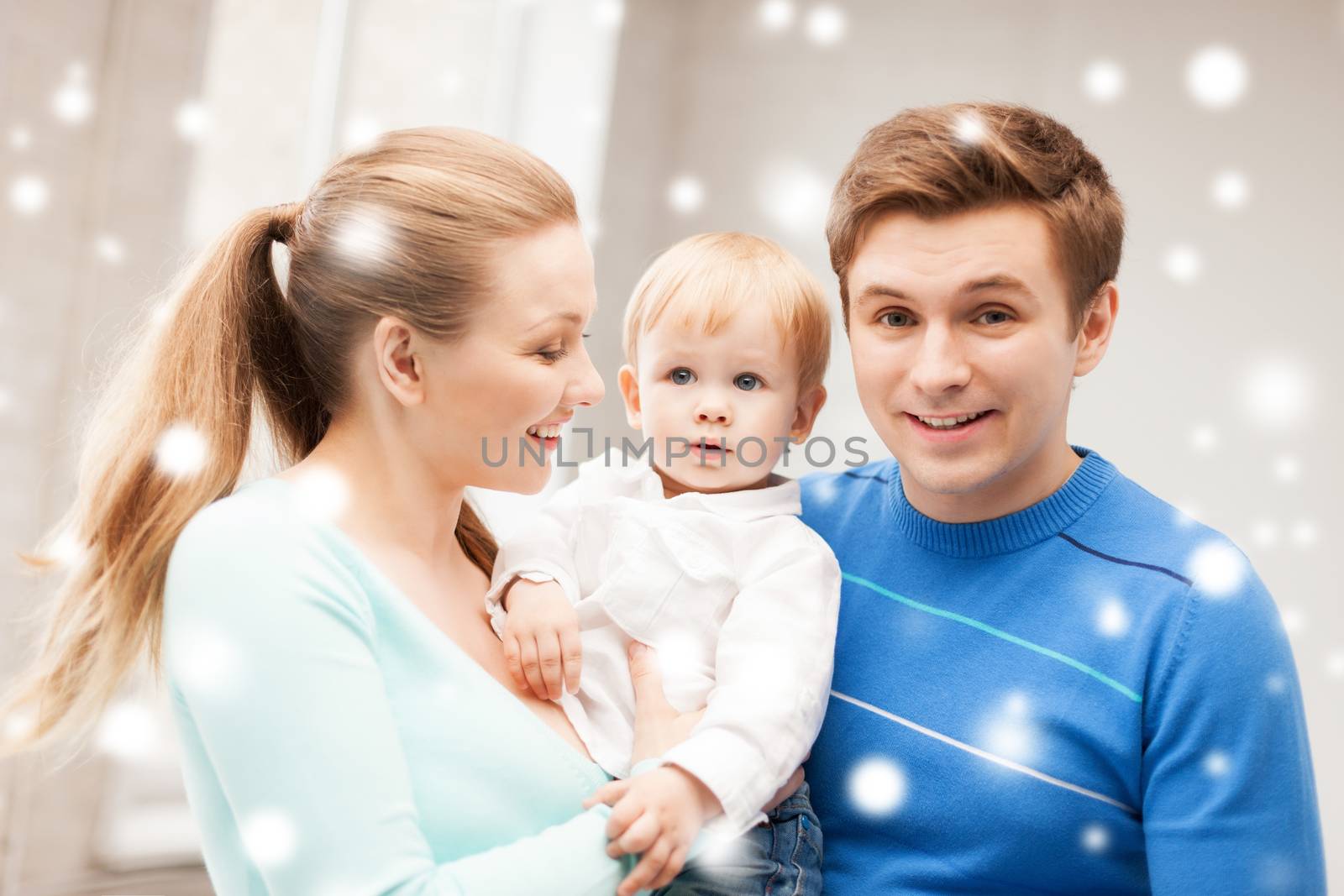 family, children, christmas, x-mas, love concept - happy parents playing with adorable baby
