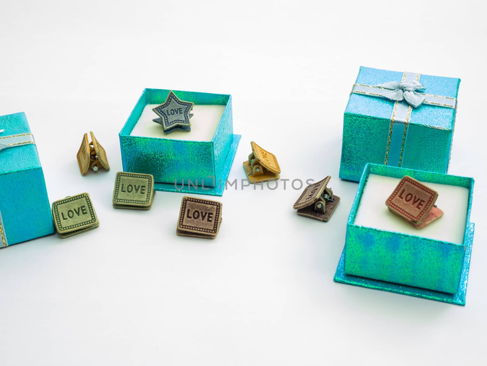 beautiful colors gift boxes and cute paper clips by golengstock