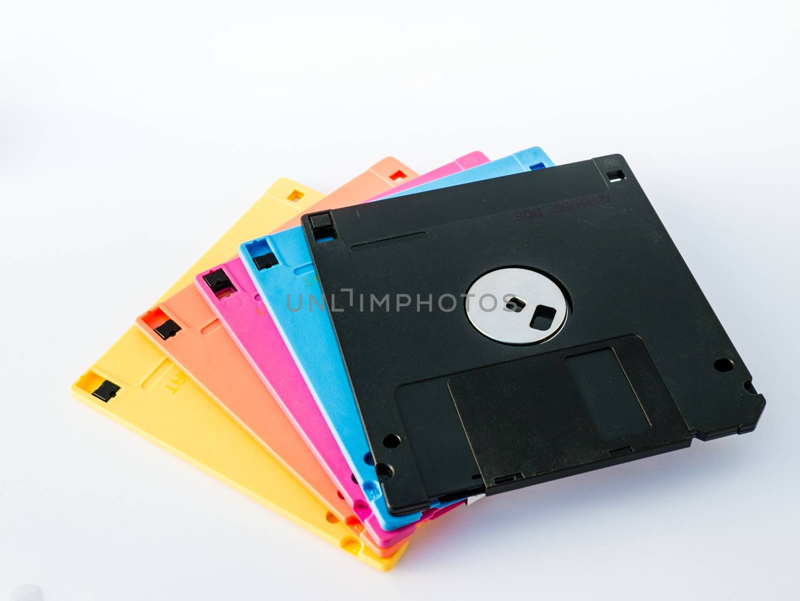 A floppy disk, or diskette, is a disk storage medium composed of a disk of thin and flexible magnetic storage medium, sealed in a rectangular plastic carrier lined with fabric that removes dust particles.