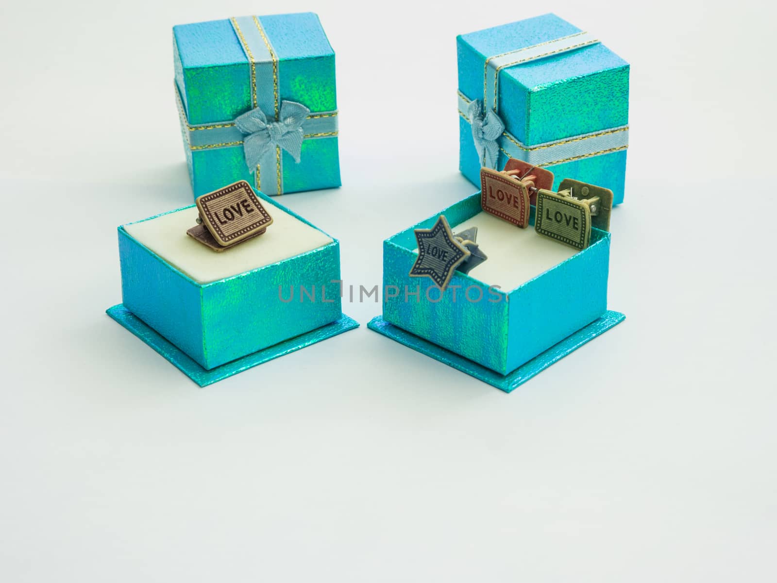beautiful colors gift boxes and cute paper clips by golengstock