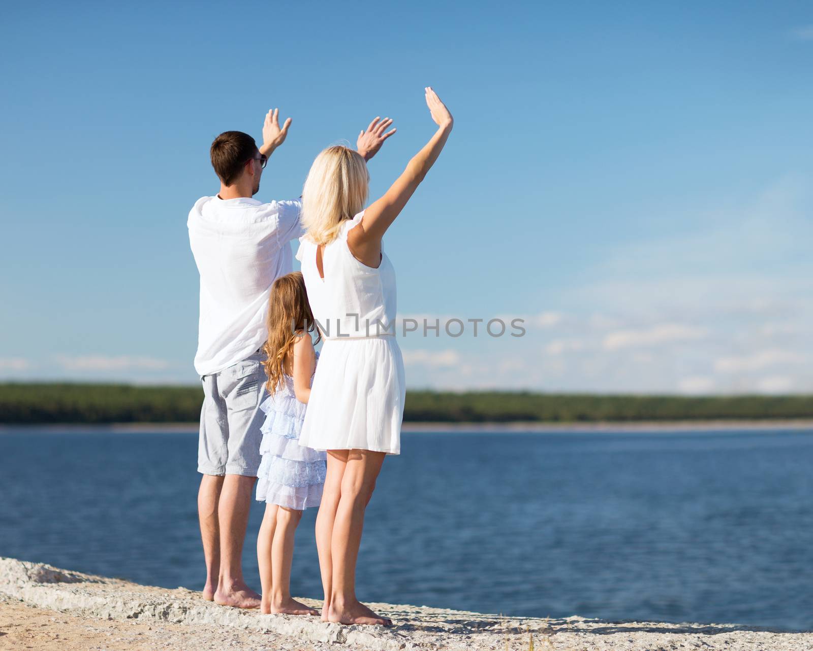 happy family at the seaside by dolgachov