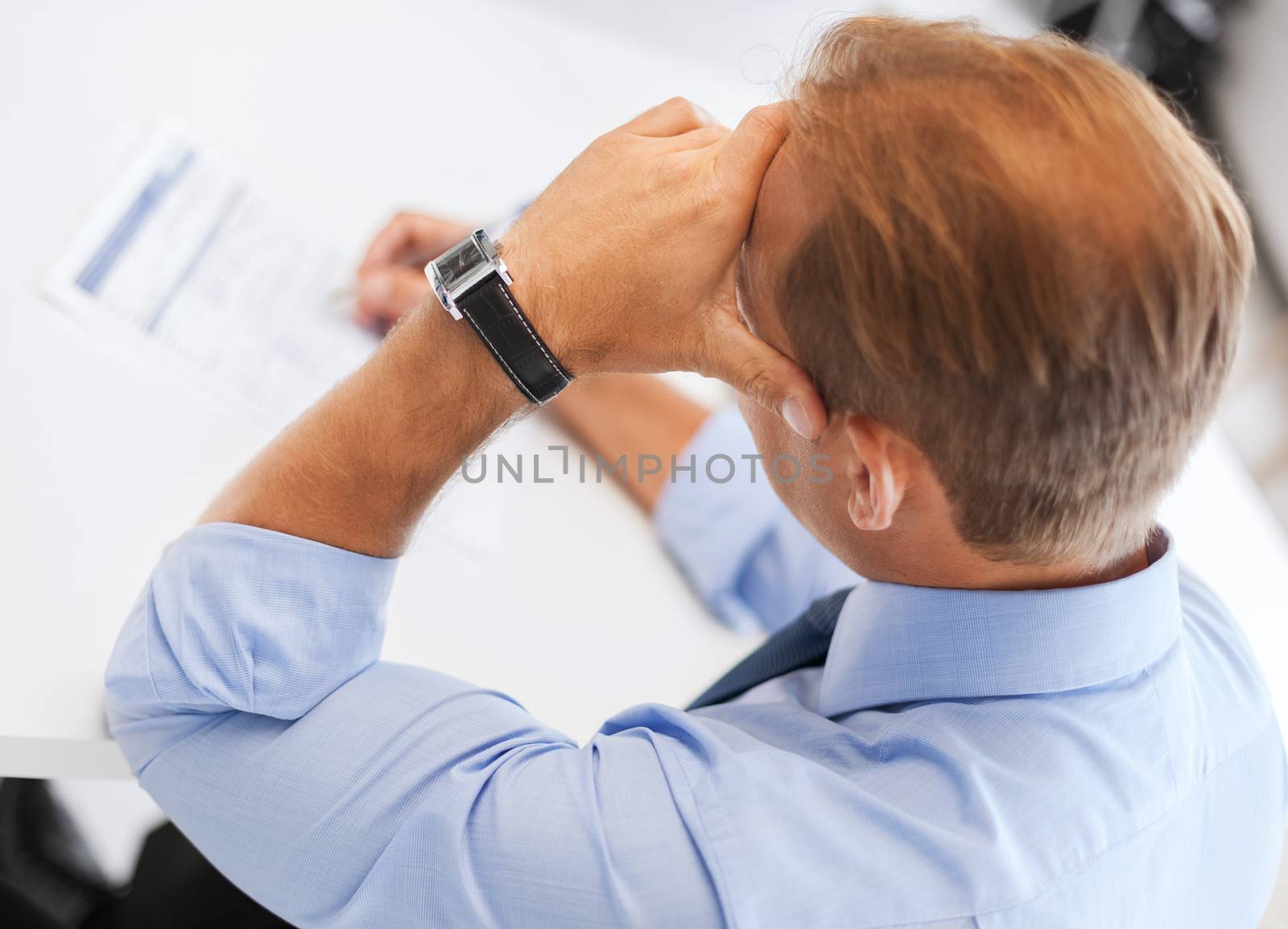 business, office, school and education concept - man signing a contract
