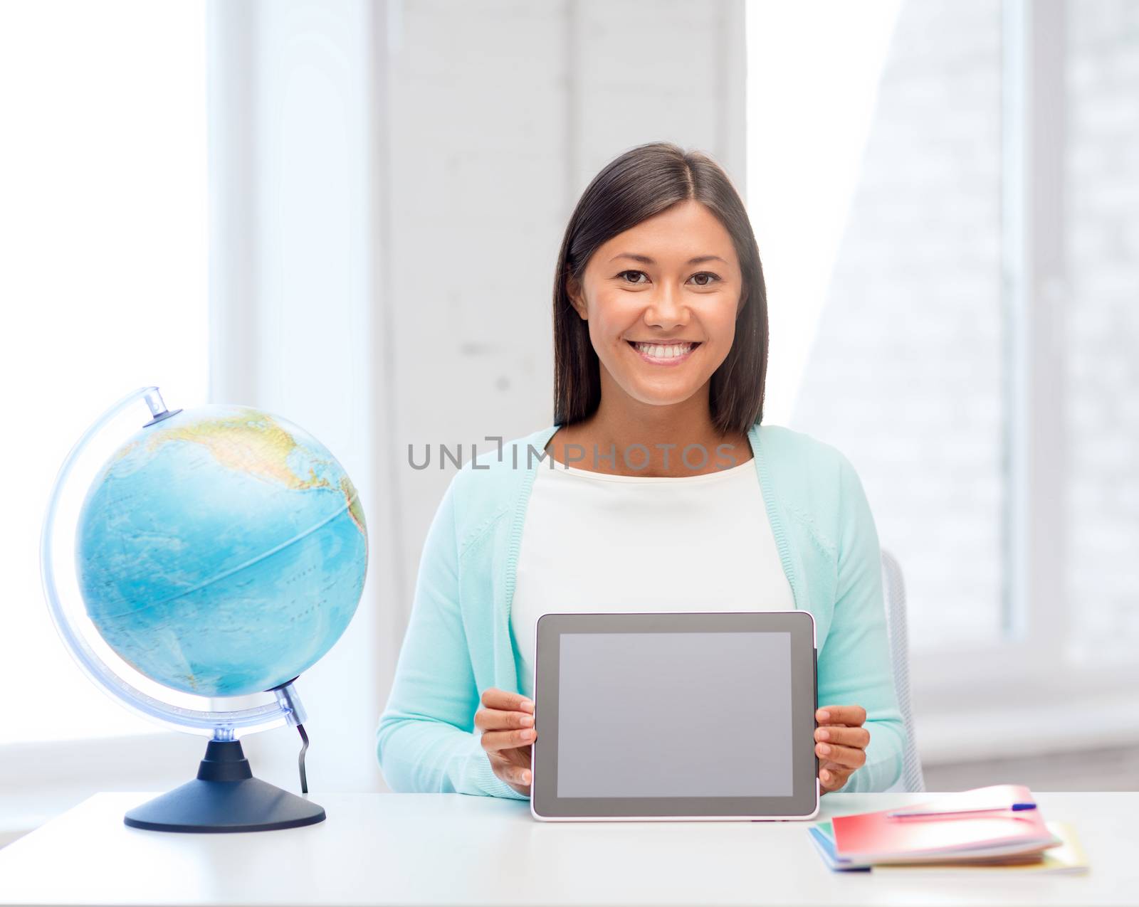education and school, travel concept - female teacher with globe and tablet pc