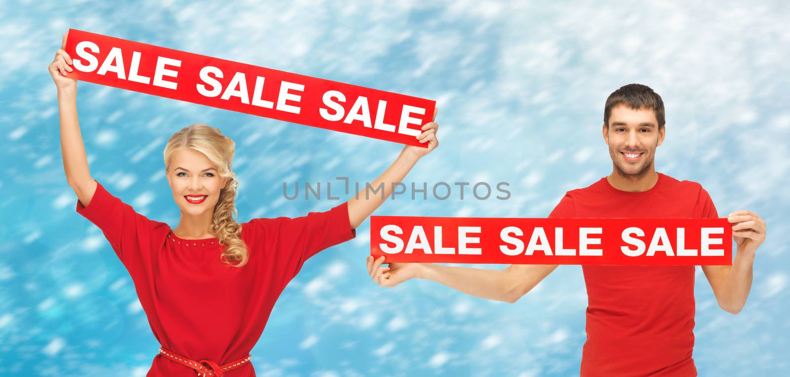 woman and man with red sale signs by dolgachov