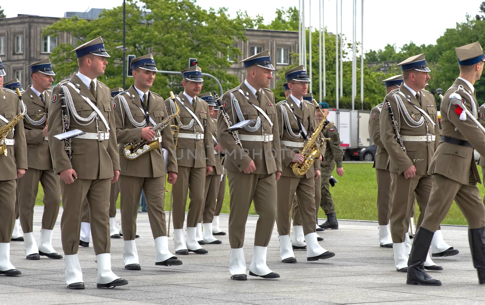 Warsaw, Poland – May 12, 2014: Danish Crown Prince Couple on state visit to Poland. Polish military band performing during parade.