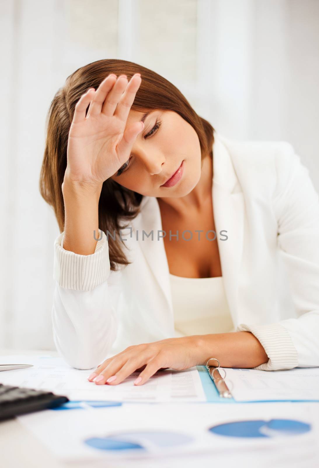 bored and tired woman with documents by dolgachov