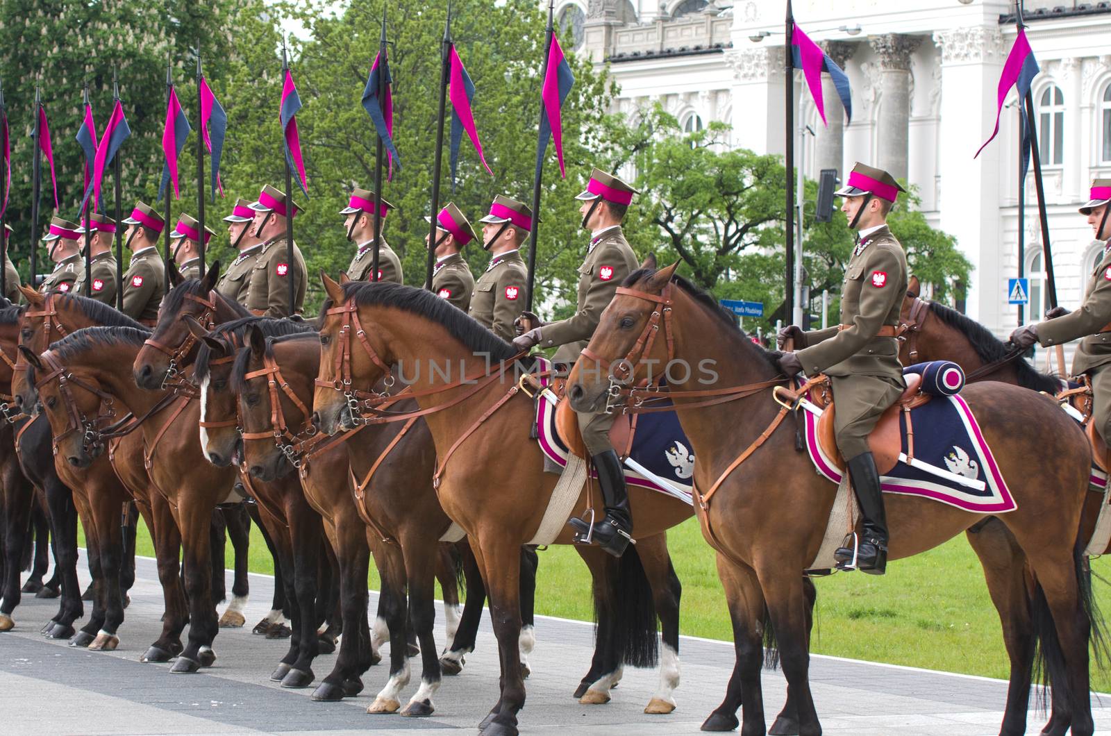 Warsaw, Poland – May 12, 2014: Danish Crown Prince Couple on state visit to Poland. Polish cavalrymen at the military parade.