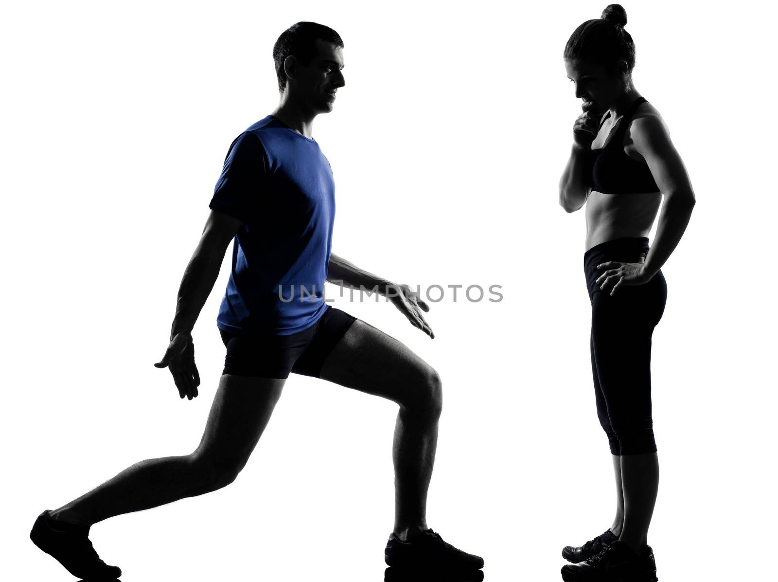 couple woman man exercising workout fitness aerobics posture in silhouette studio isolated on white background
