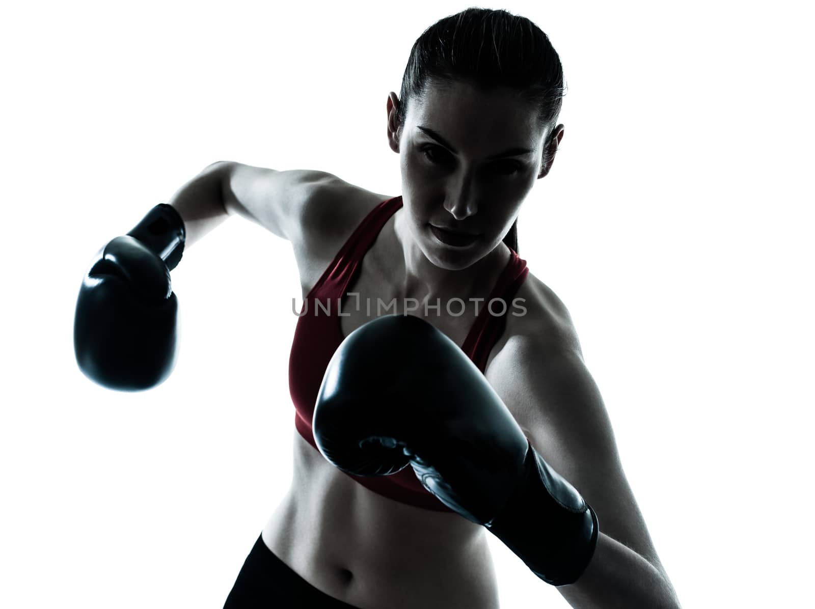 one  woman boxing exercising in silhouette studio isolated on white background