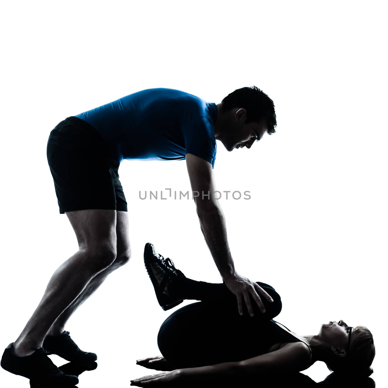 aerobics instructor with mature woman exercising fitness workout in silhouette studio isolated on white background