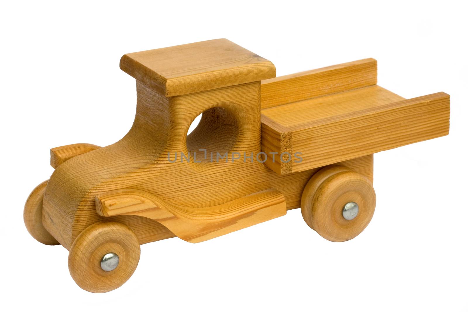 Old homemade wooden toy truck isolated on white