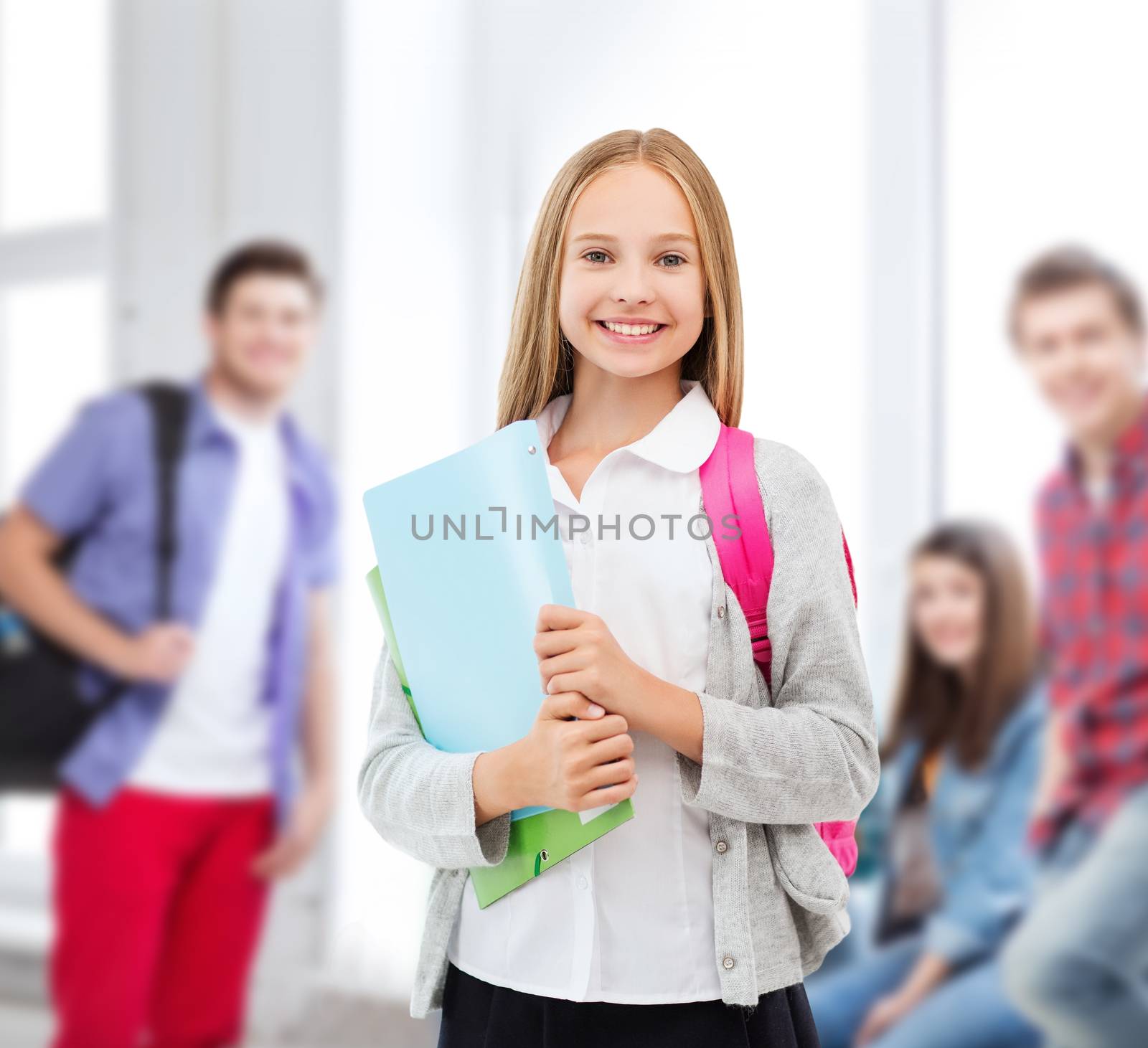 happy and smiling teenage girl by dolgachov