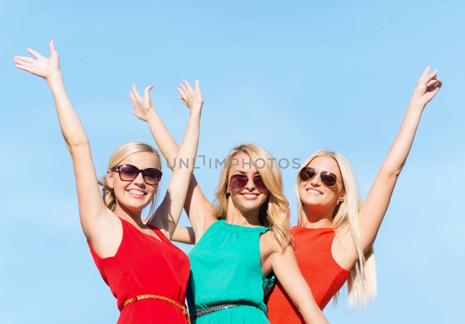 three beautiful women outdoors by dolgachov