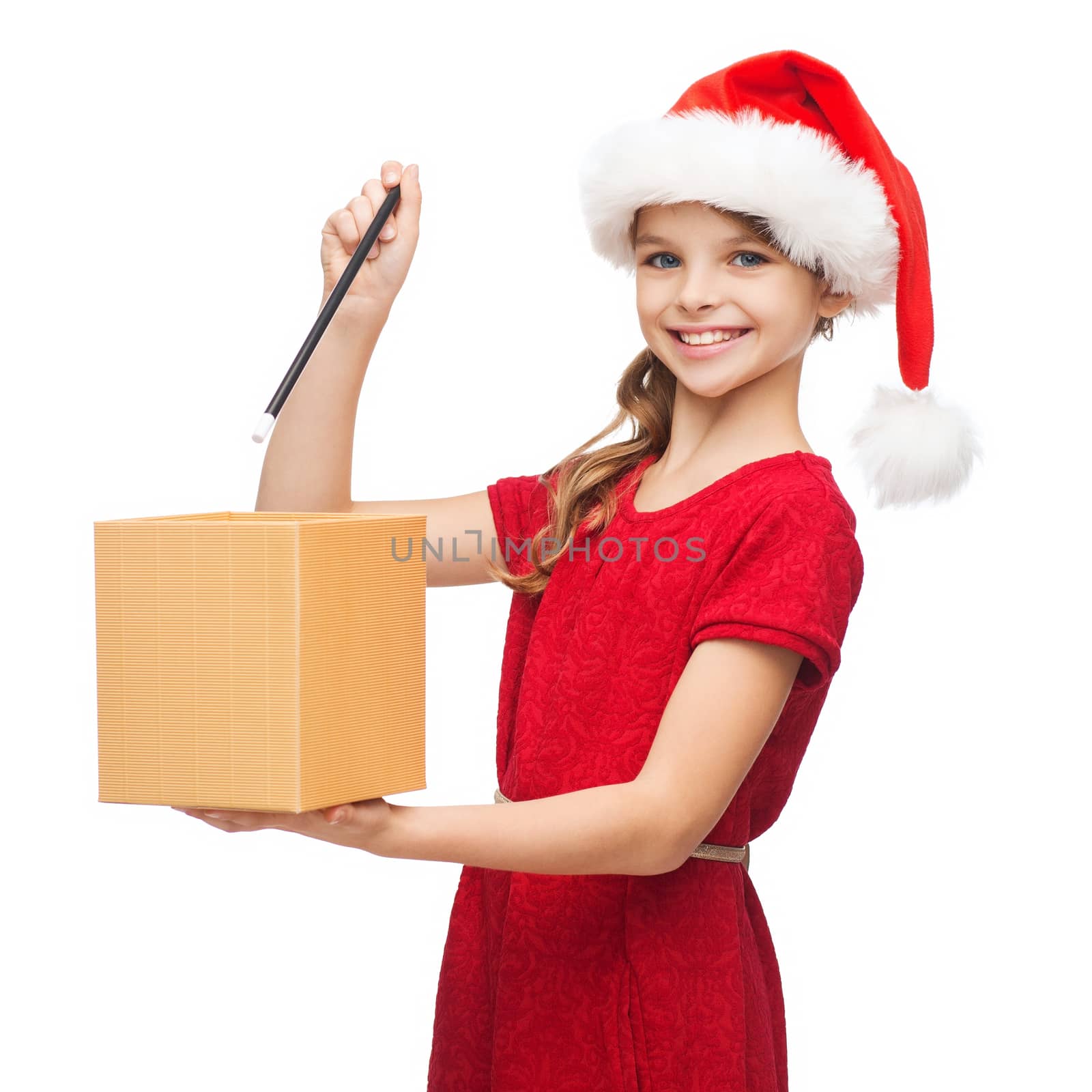 smiling girl in santa helper hat with gift box by dolgachov