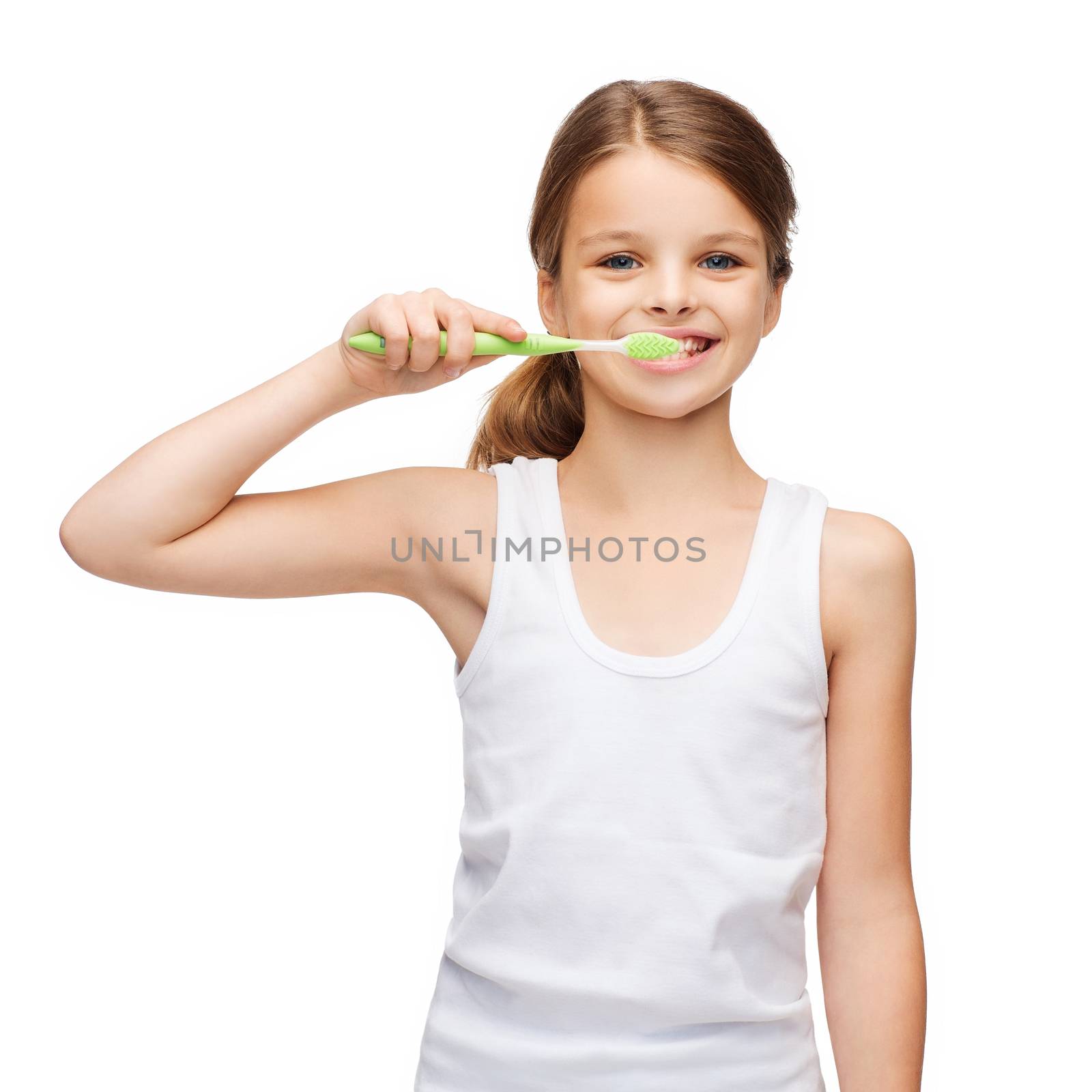 girl in blank white shirt brushing her teeth by dolgachov