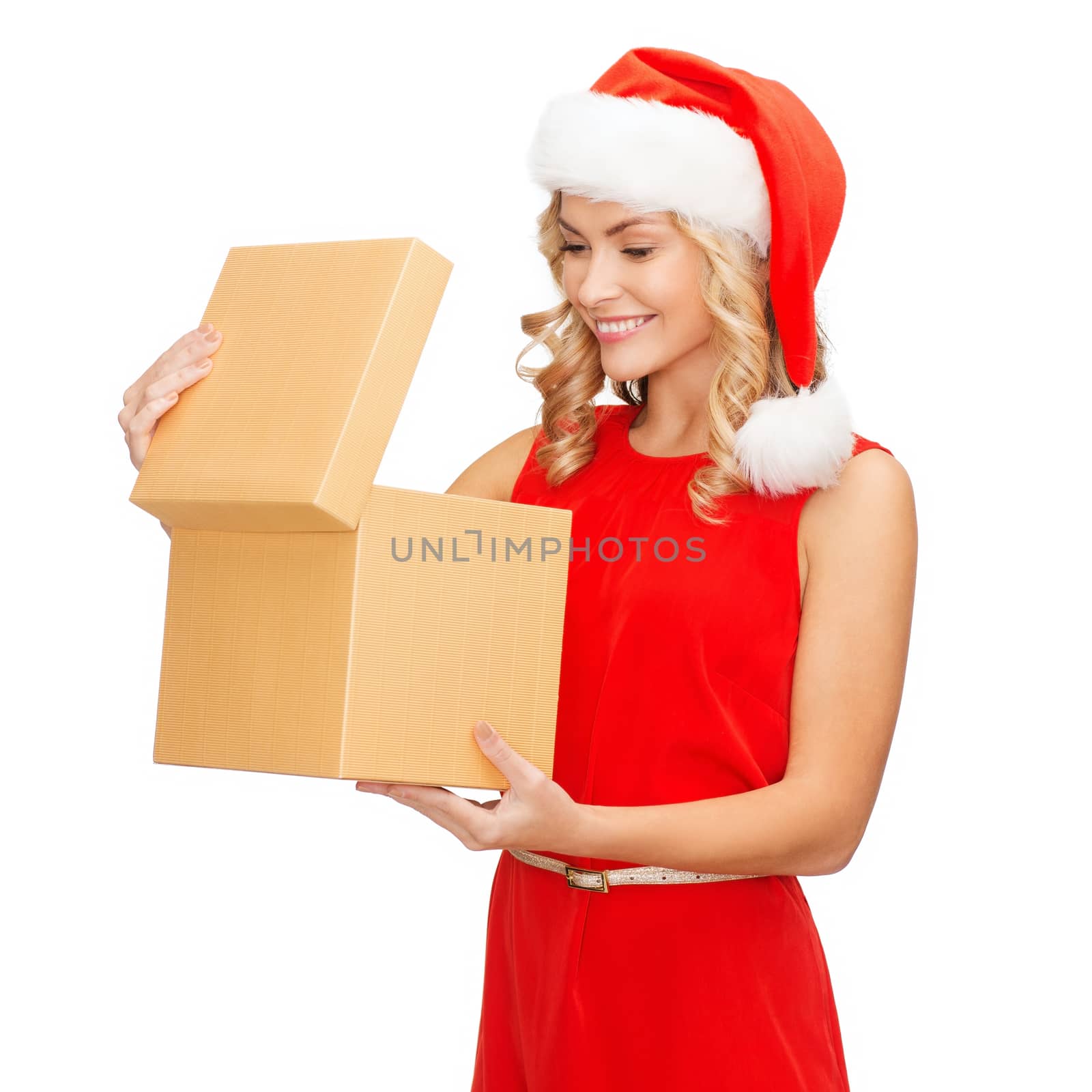 smiling woman in santa helper hat with gift box by dolgachov