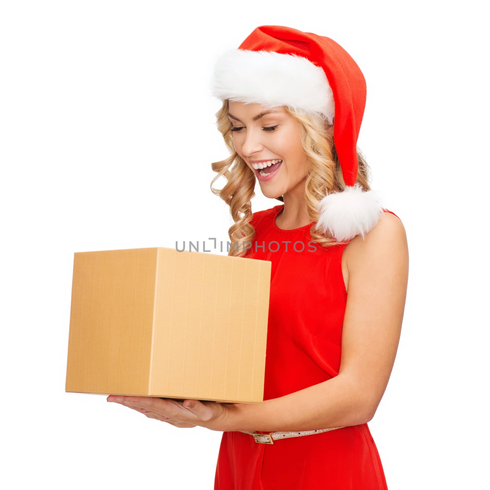 smiling woman in santa helper hat with gift box by dolgachov
