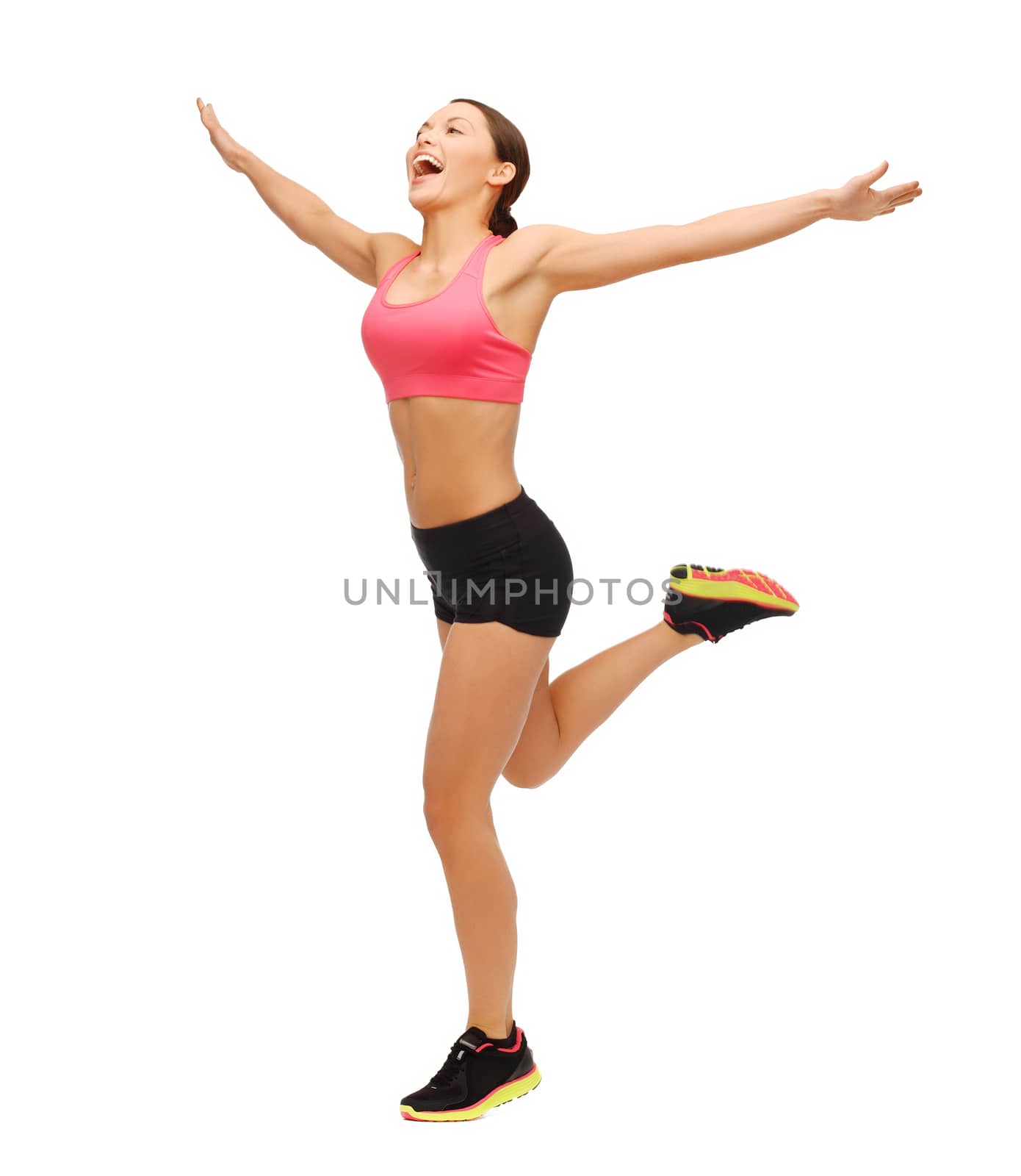 beautiful sporty woman running or jumping by dolgachov