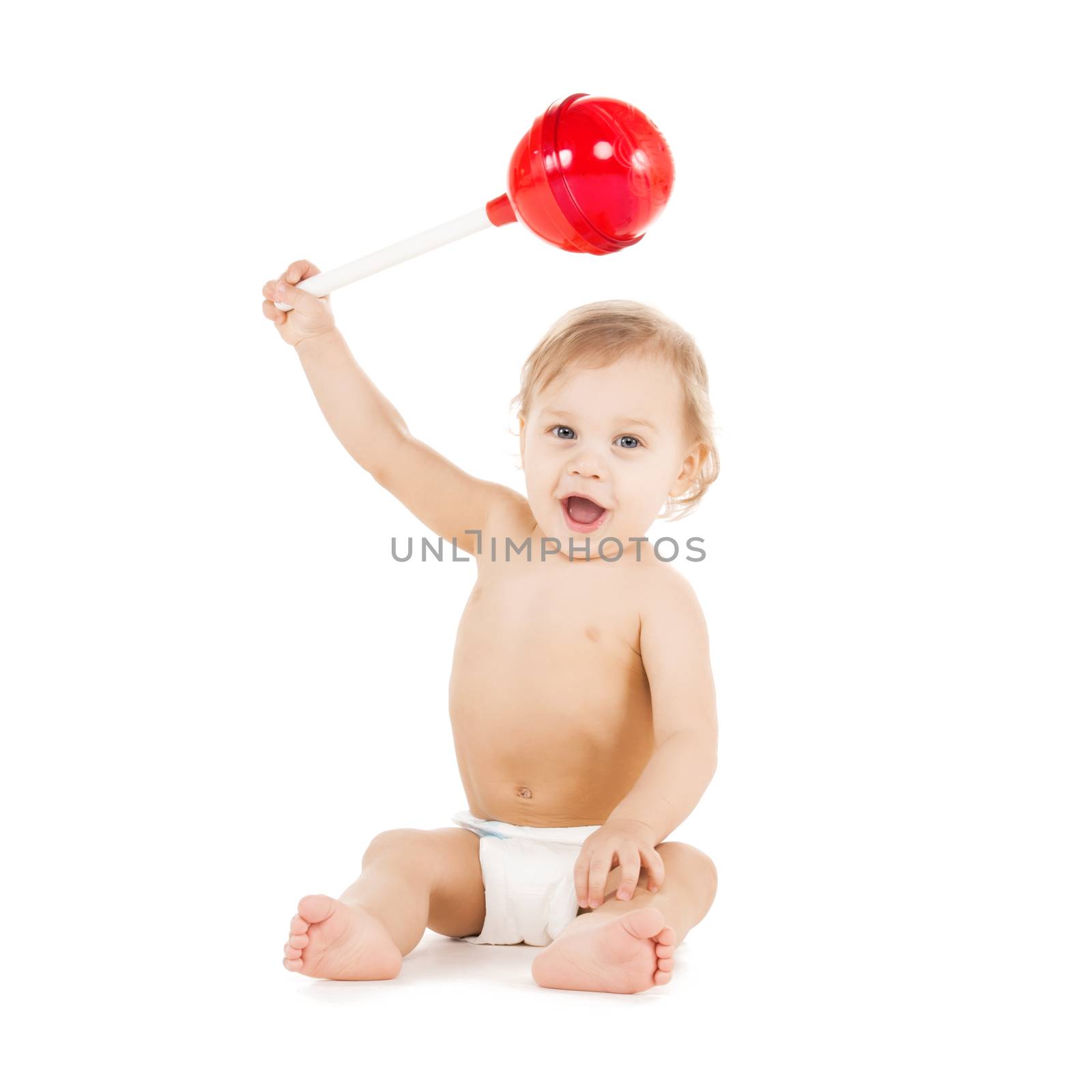 cute little boy playing with big lollipop by dolgachov