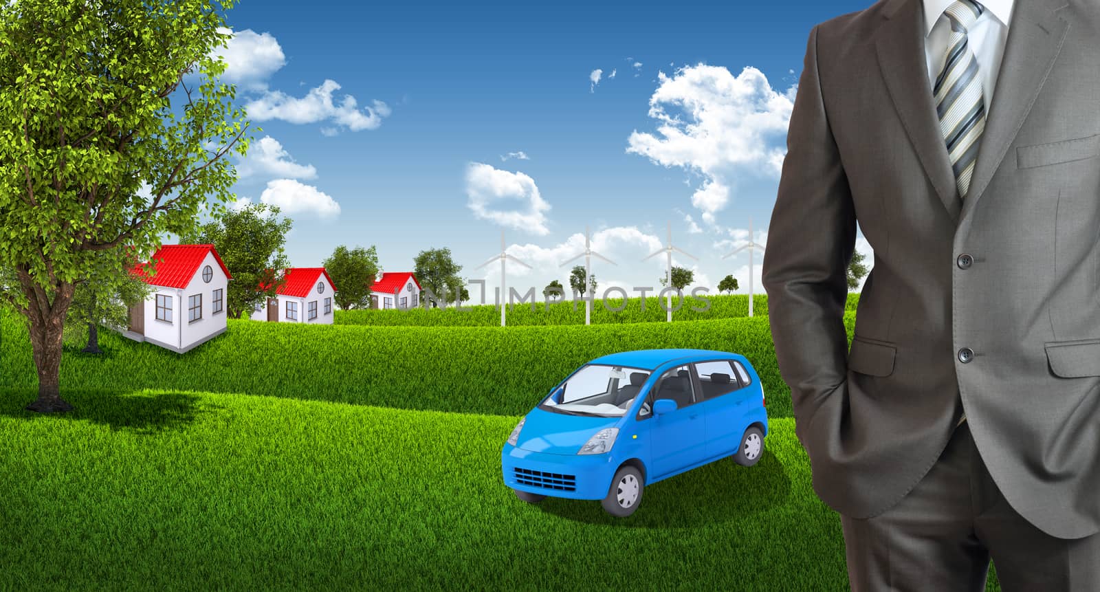 Businessman standing with hands in pockets. Houses and green landscape as backdrop