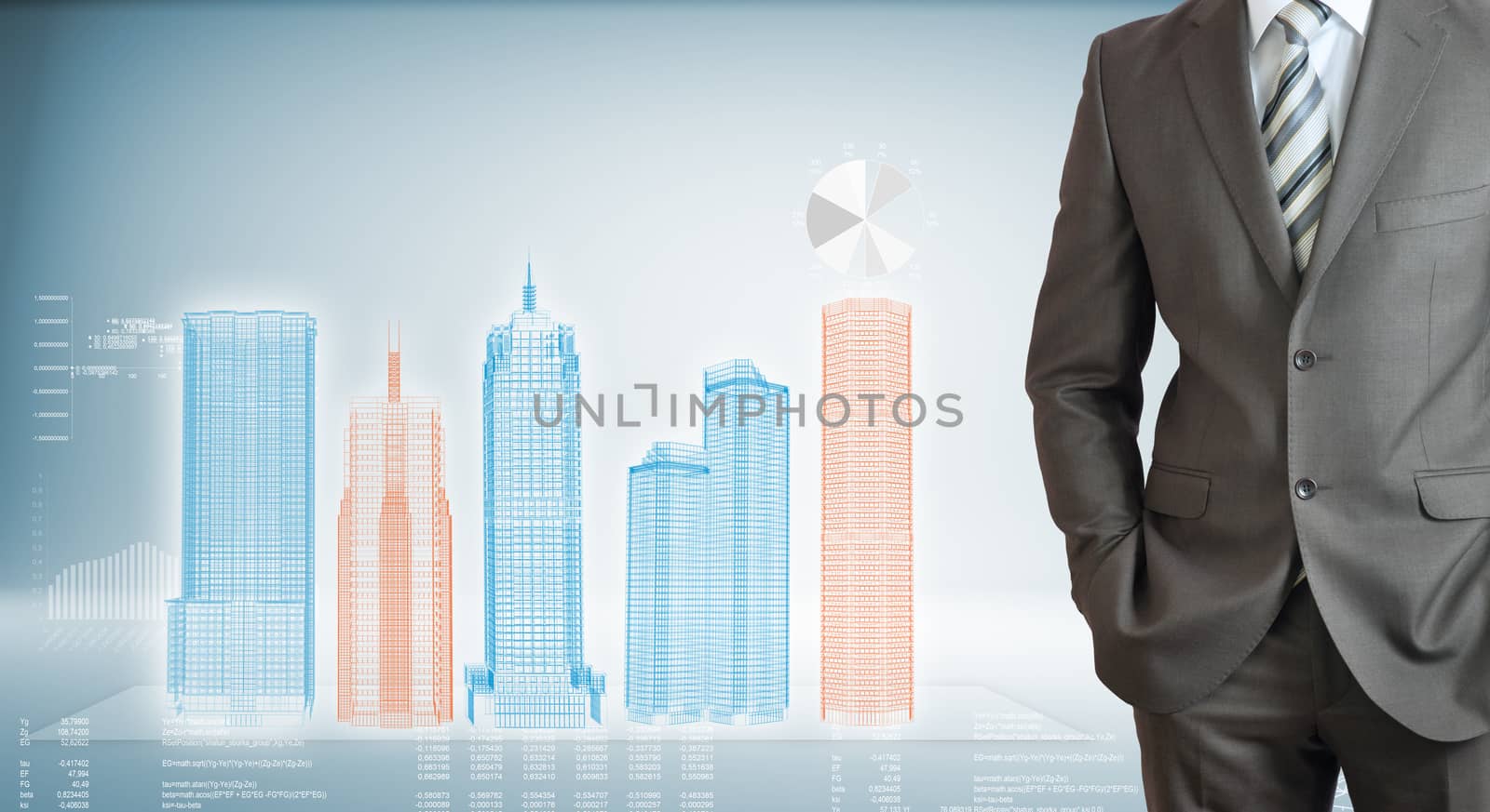 Businessman standing with hands in pockets. On background of the high-tech wire frame skyscrapers and graphs