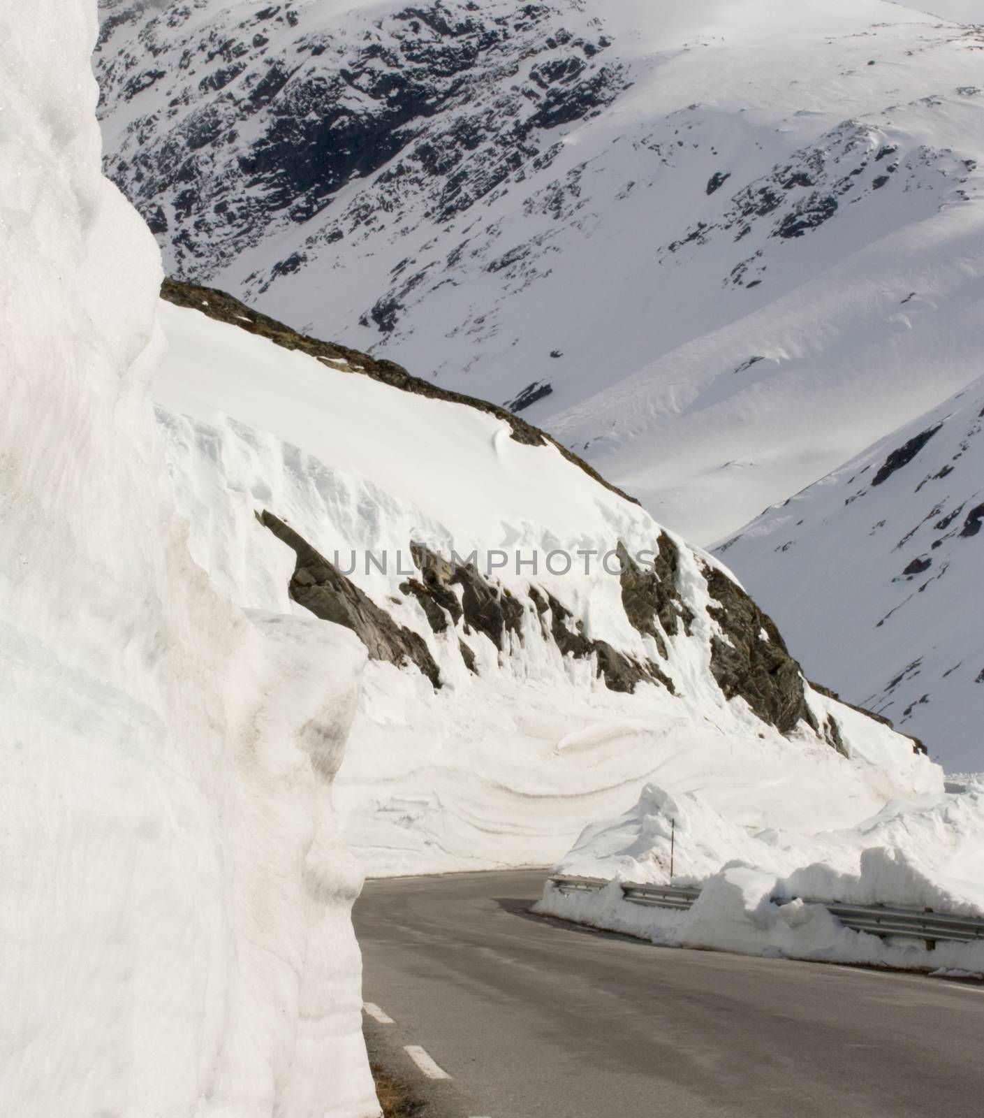 Snowy mountain road leading to Geiranger, Norway