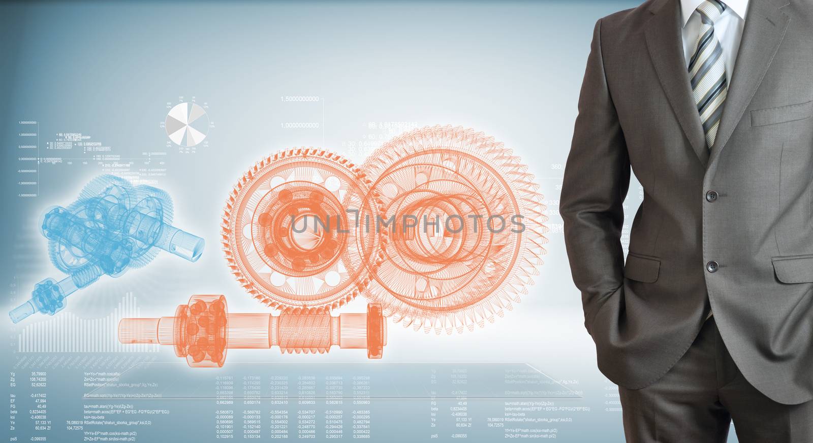 Businessman standing with hands in pockets. High-tech wire frame gears and graphs at backdrop