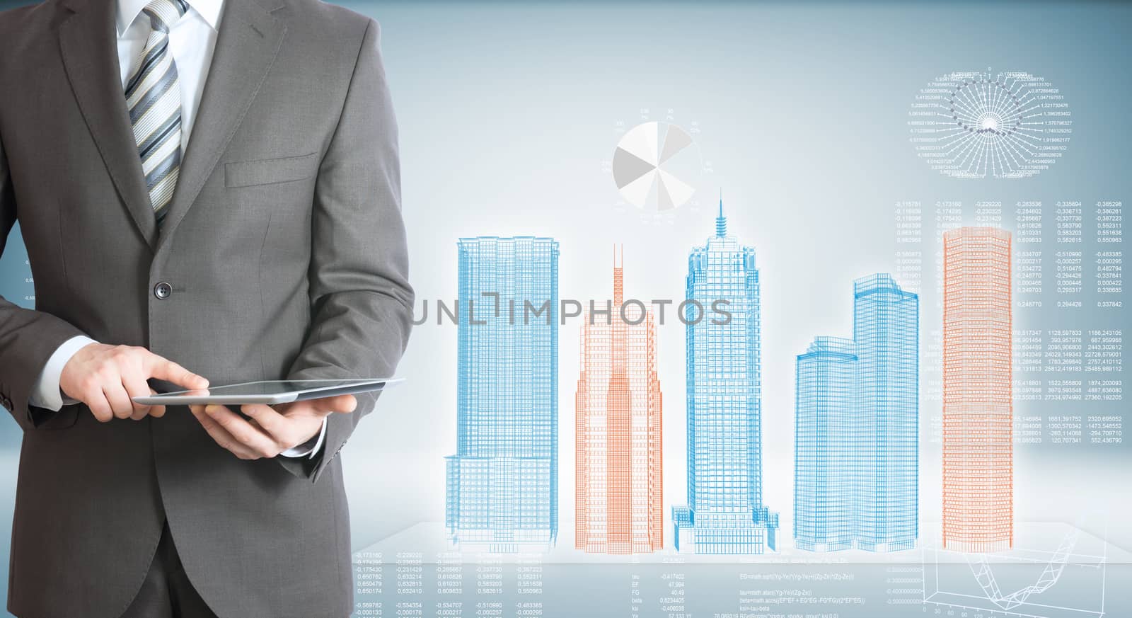Businessman with tablet pc. High-tech skyscrapers by cherezoff