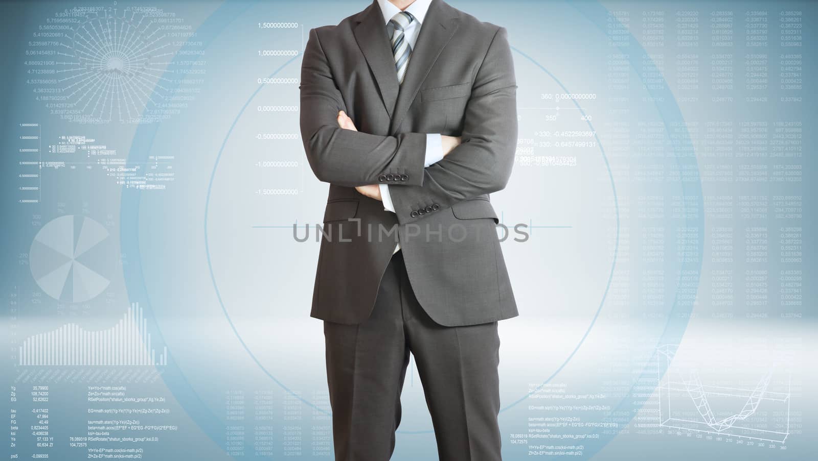 Businessman standing with his arms crossed by cherezoff