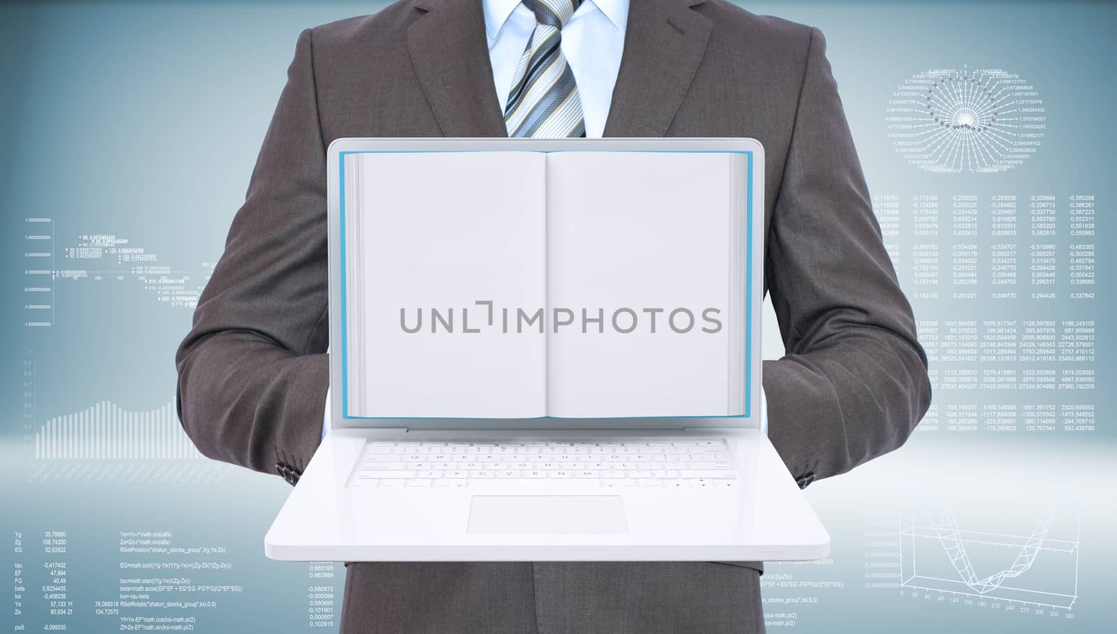Businessman standing with open laptop and book by cherezoff