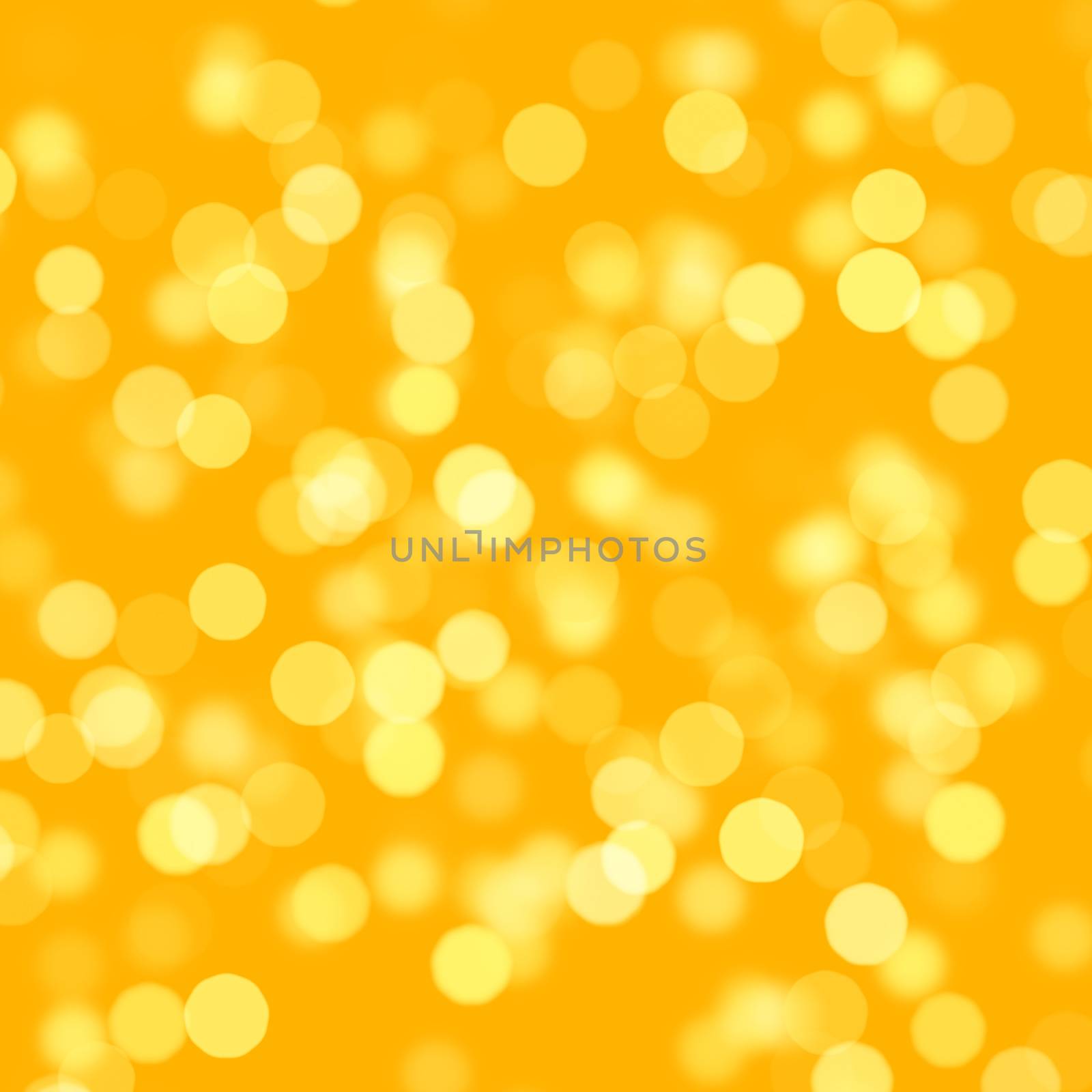 Blurred golden circles that look like out of focus bokeh.