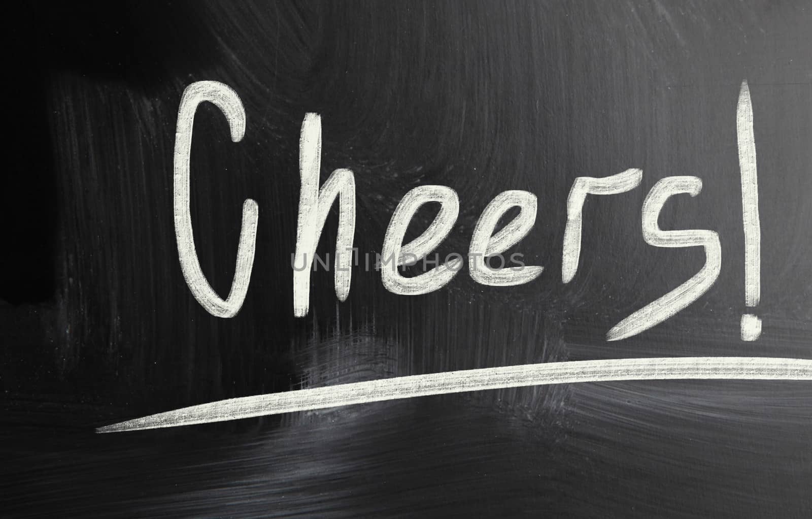 cheers handwritten with chalk on a blackboard