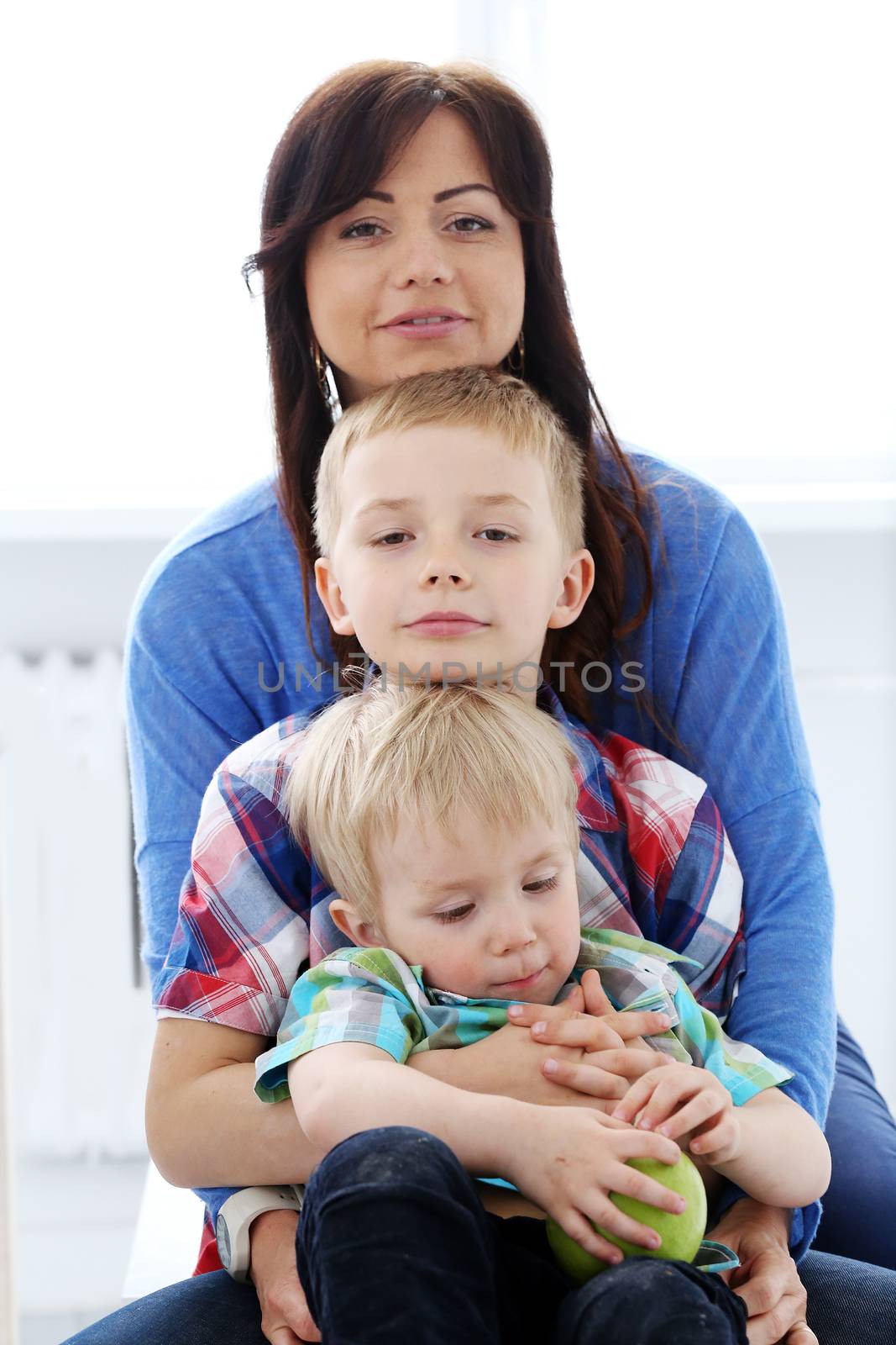 Mother and two brothers during family breakfast