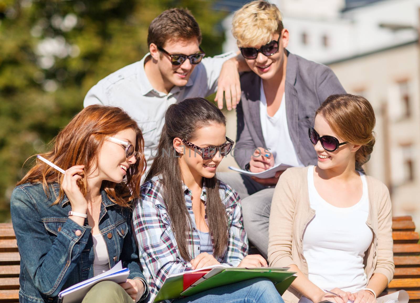 group of students or teenagers hanging out by dolgachov